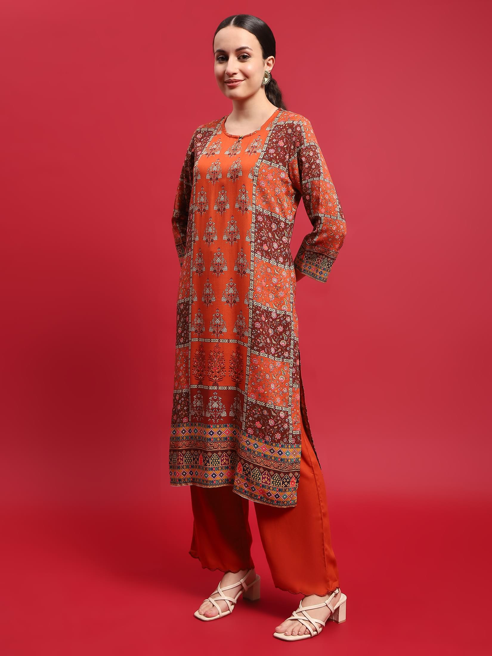Women Liva Rayon Orange Floral Print Kurta With Comfort Pant.