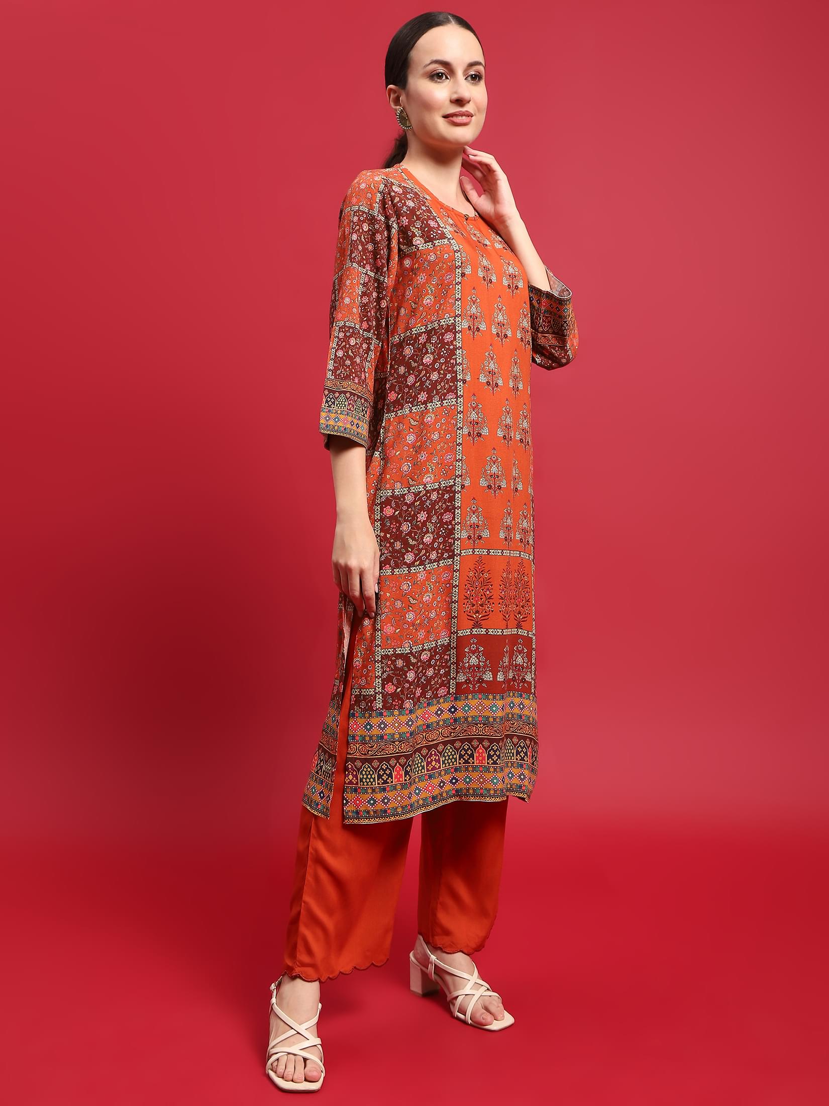 Women Liva Rayon Orange Floral Print Kurta With Comfort Pant.