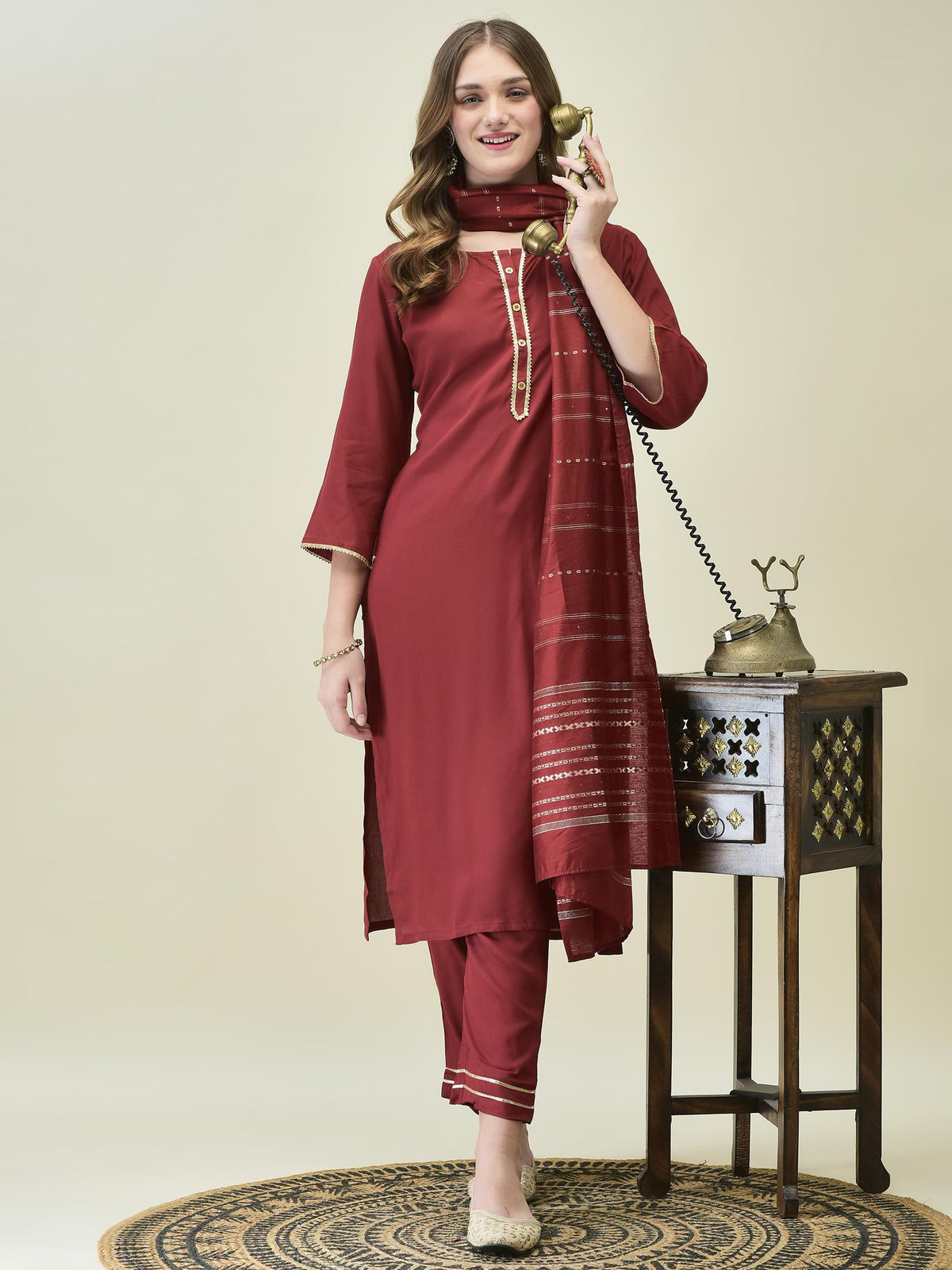 Women Liva Rayon Maroon Solid Kurta Trouser Dupatta.