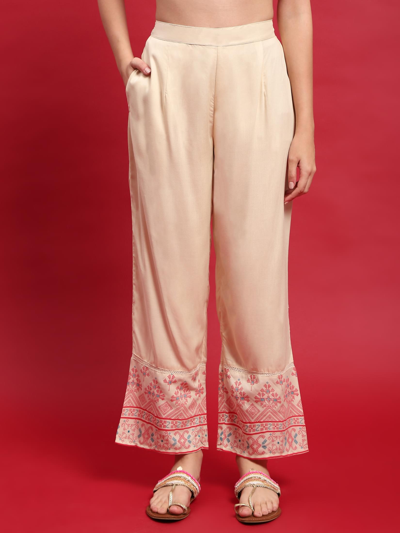 Women Liva Rayon Beige Solid Kurta With Comfort Pant.
