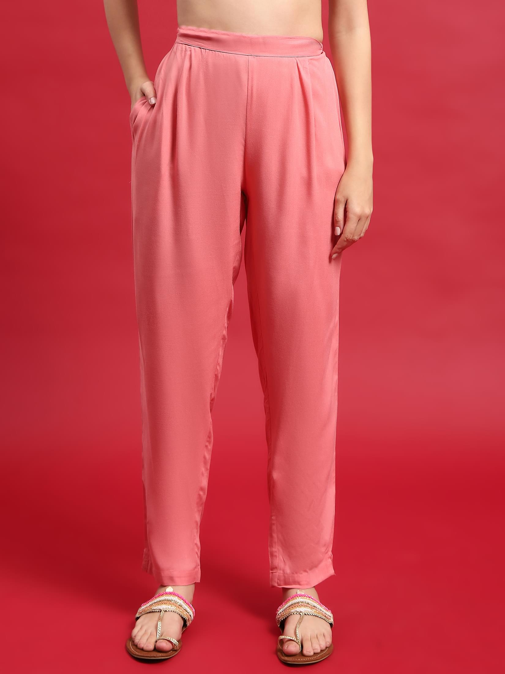 Women Liva Rayon Cream Solid Kurta With Trouser.