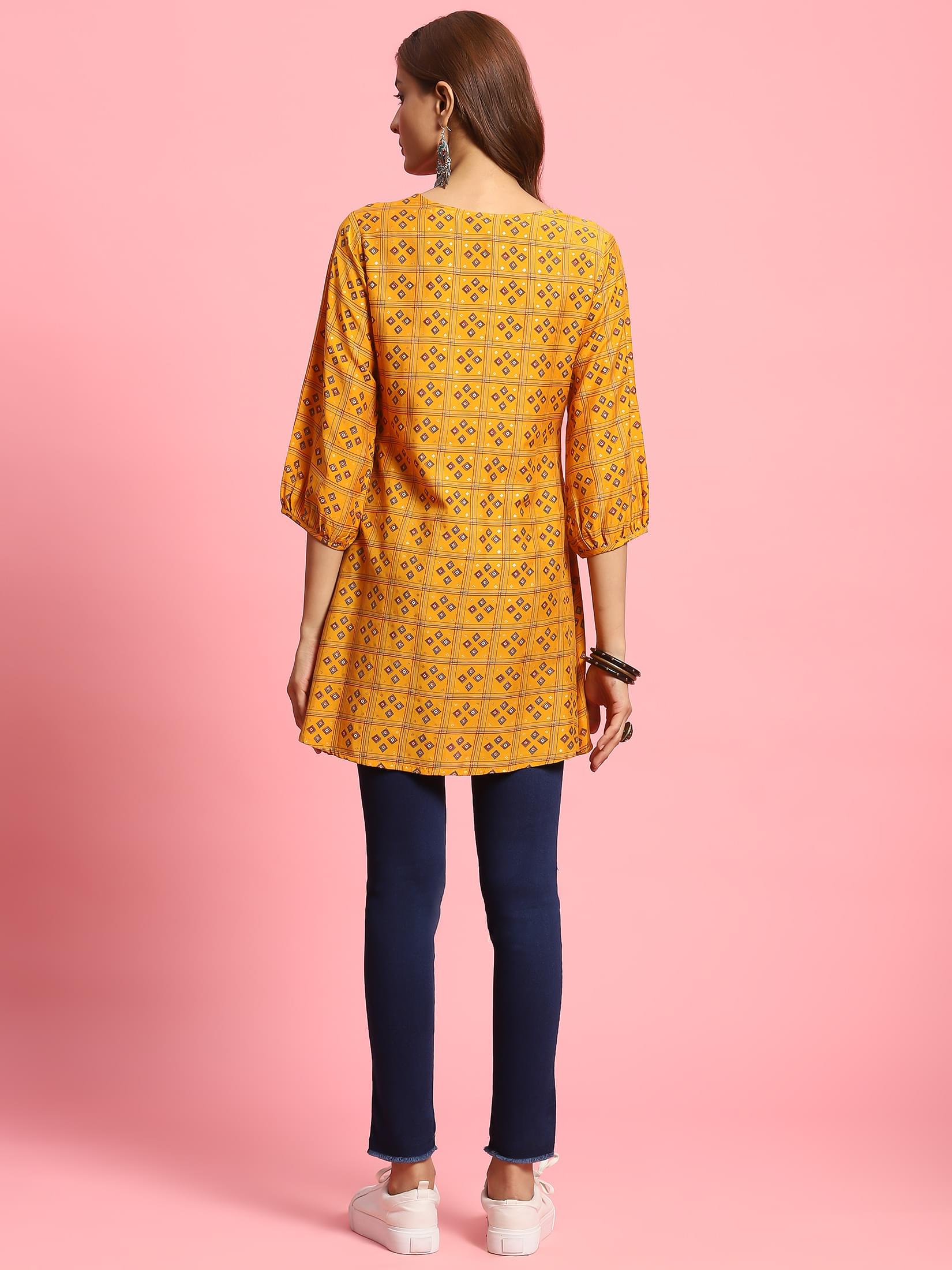Women Mustard Geometric Printed Tunic.