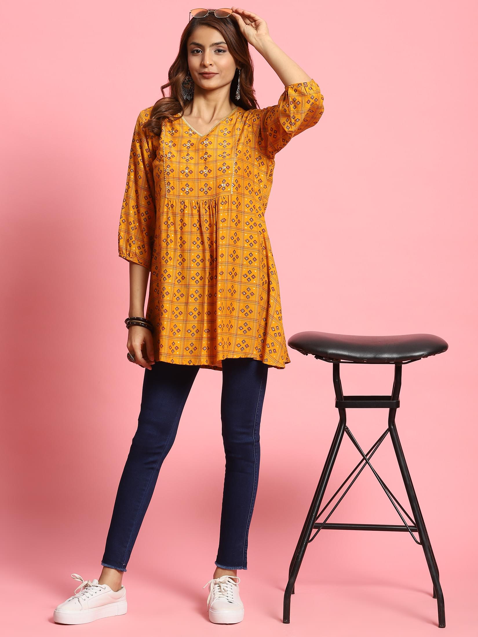 Women Mustard Geometric Printed Tunic.