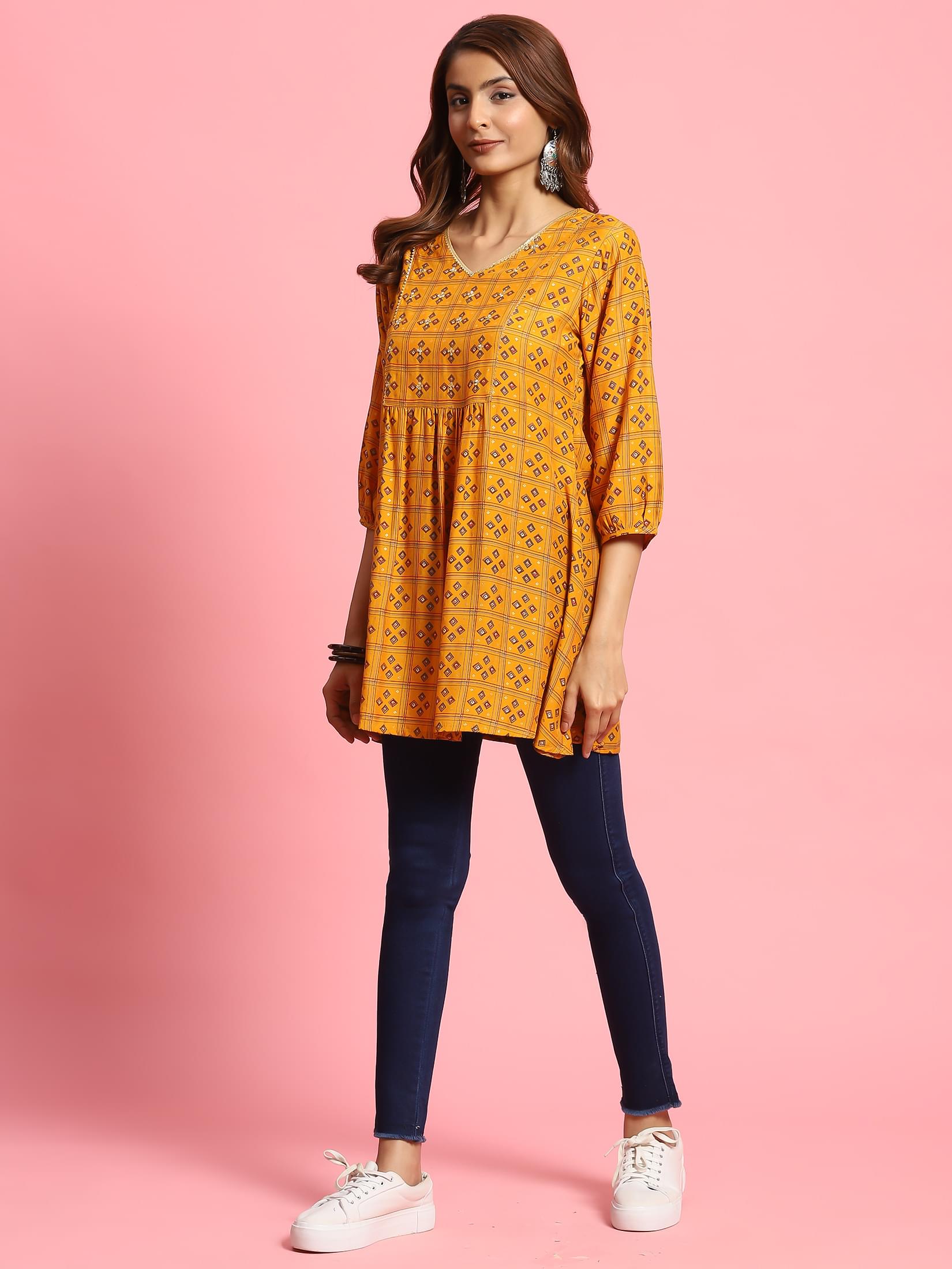 Women Mustard Geometric Printed Tunic.