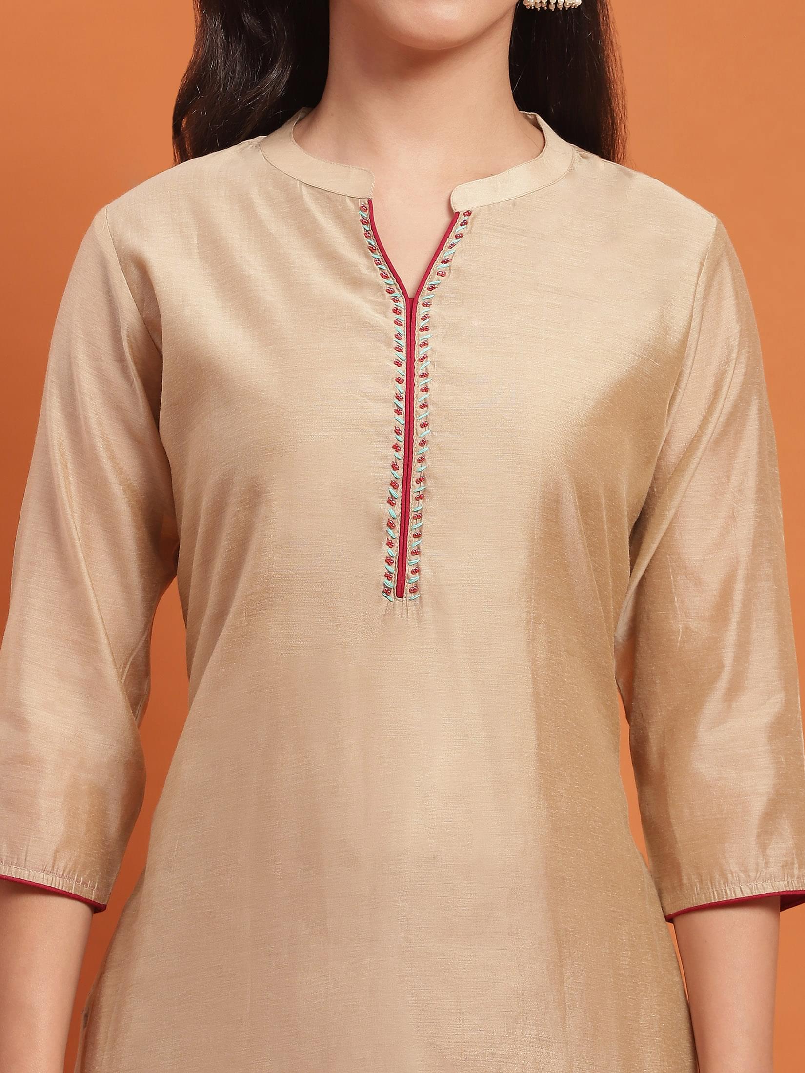 Women Beige Solid Kurta With Trouser.