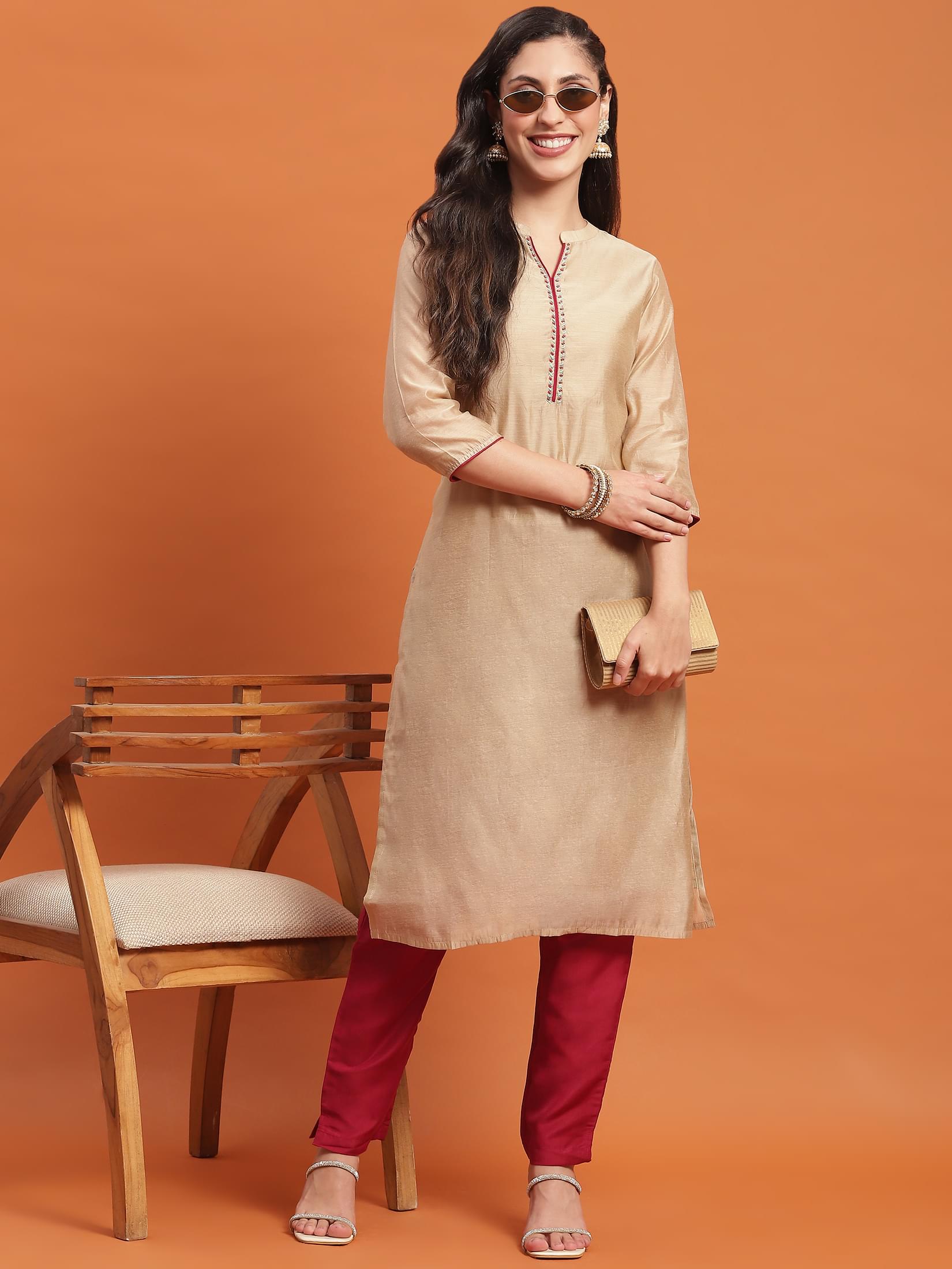 Women Beige Solid Kurta With Trouser.