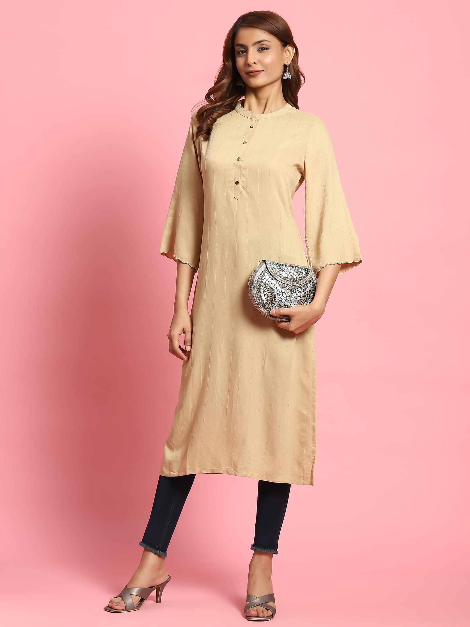 Women Beige Solid Kurta.