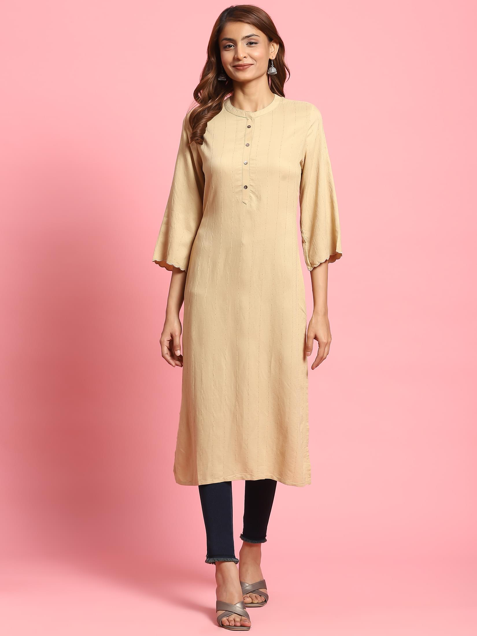 Women Beige Solid Kurta.