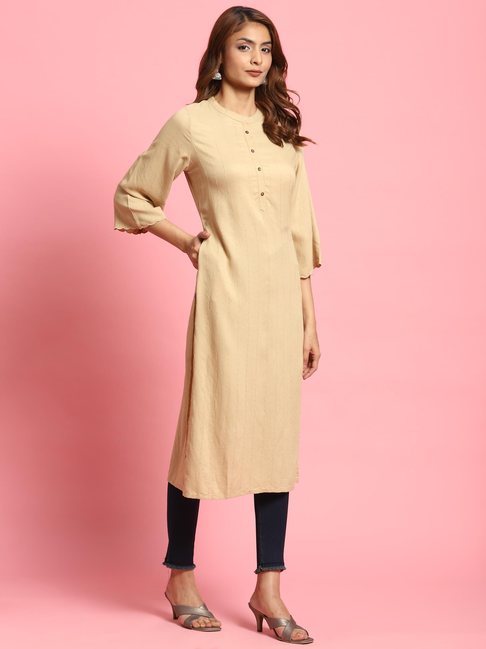 Women Beige Solid Kurta.