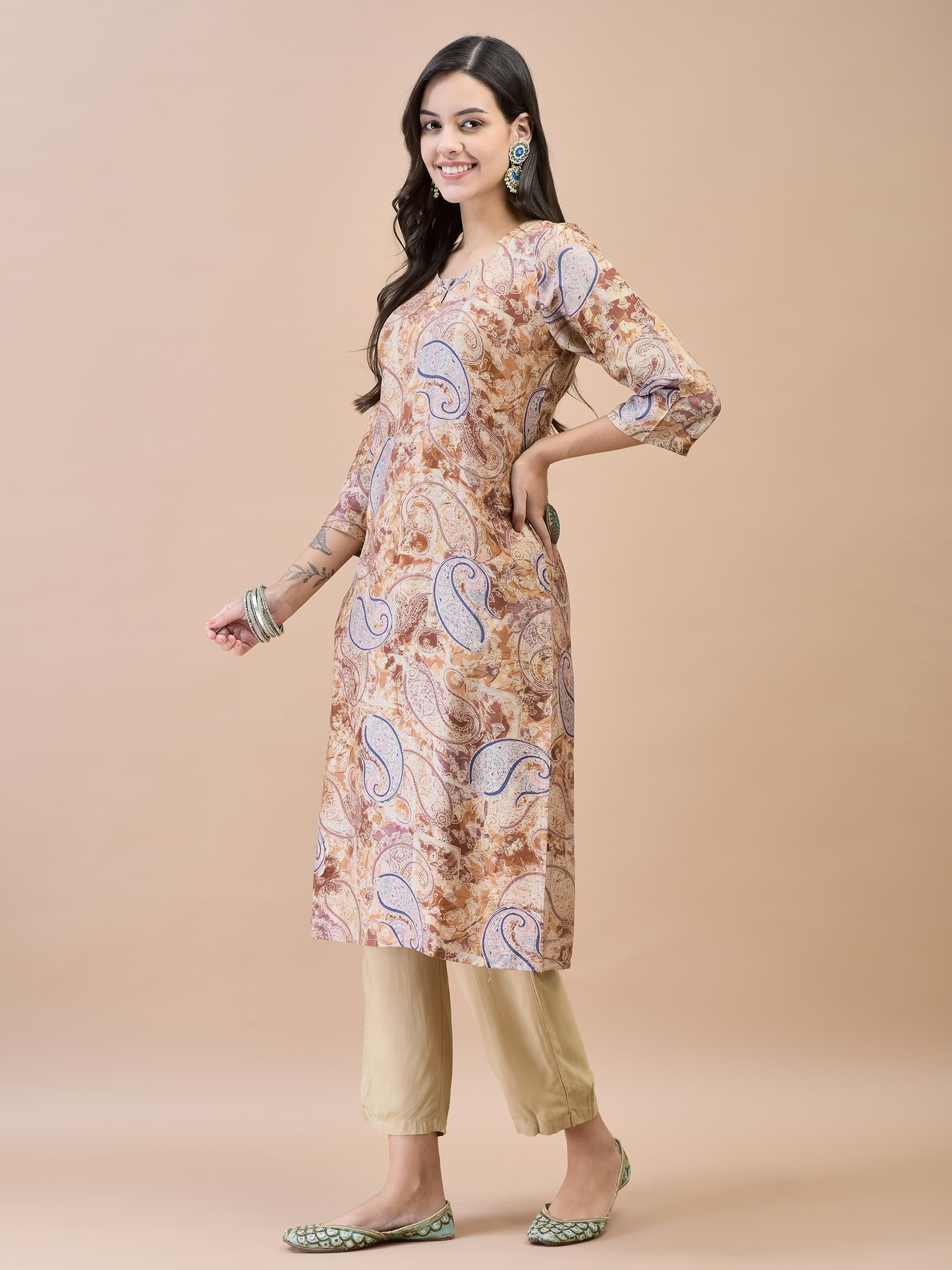 Women Shantoon Brown Solid Kurta.