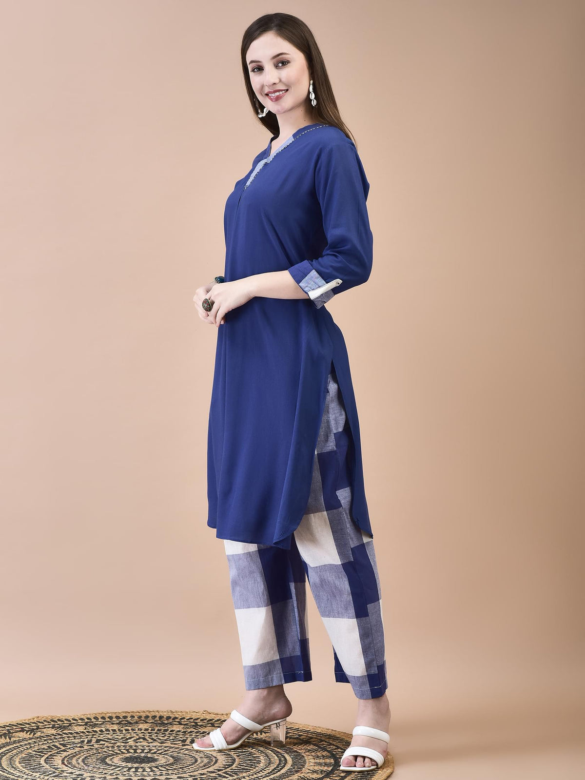 Women Liva (Rayon) Blue Solid Kurta With Cotton Comfort Pant.