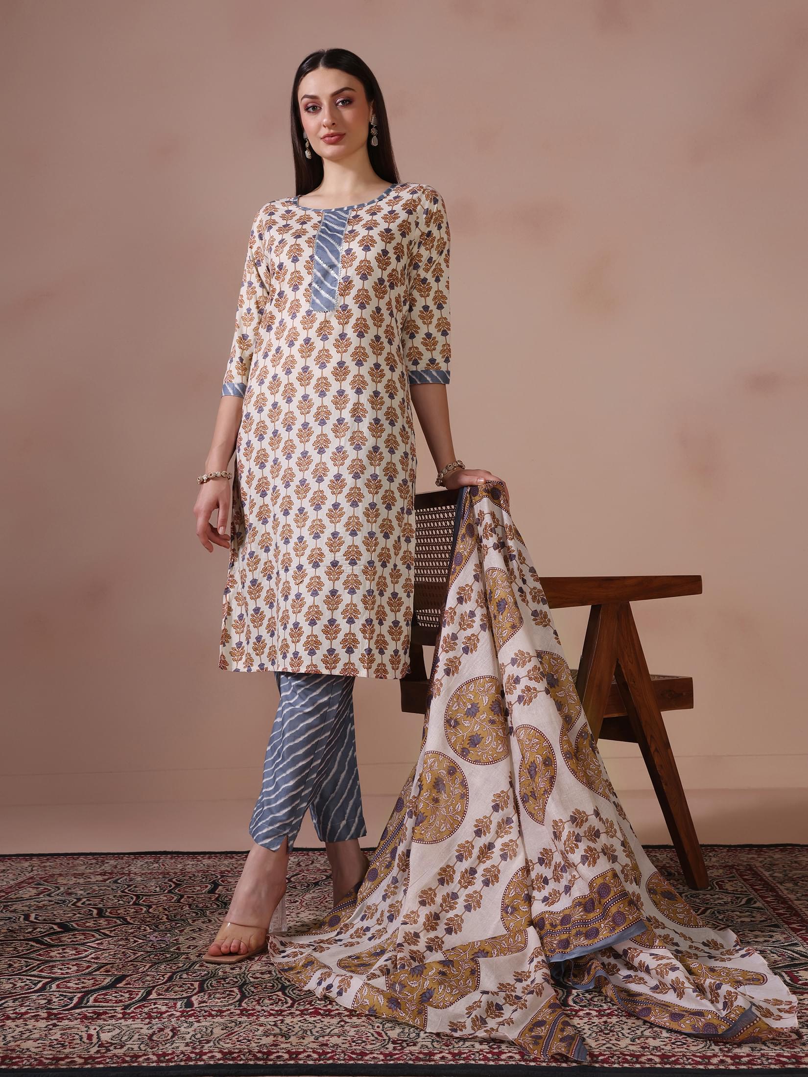 Women Cotton Cream Printed Kurta Trouser Dupatta.