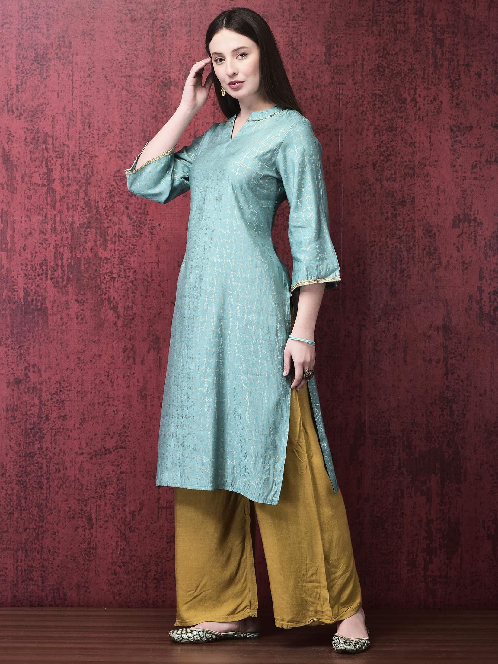 Women Liva Turquoise Blue Foil Print Kurta.
