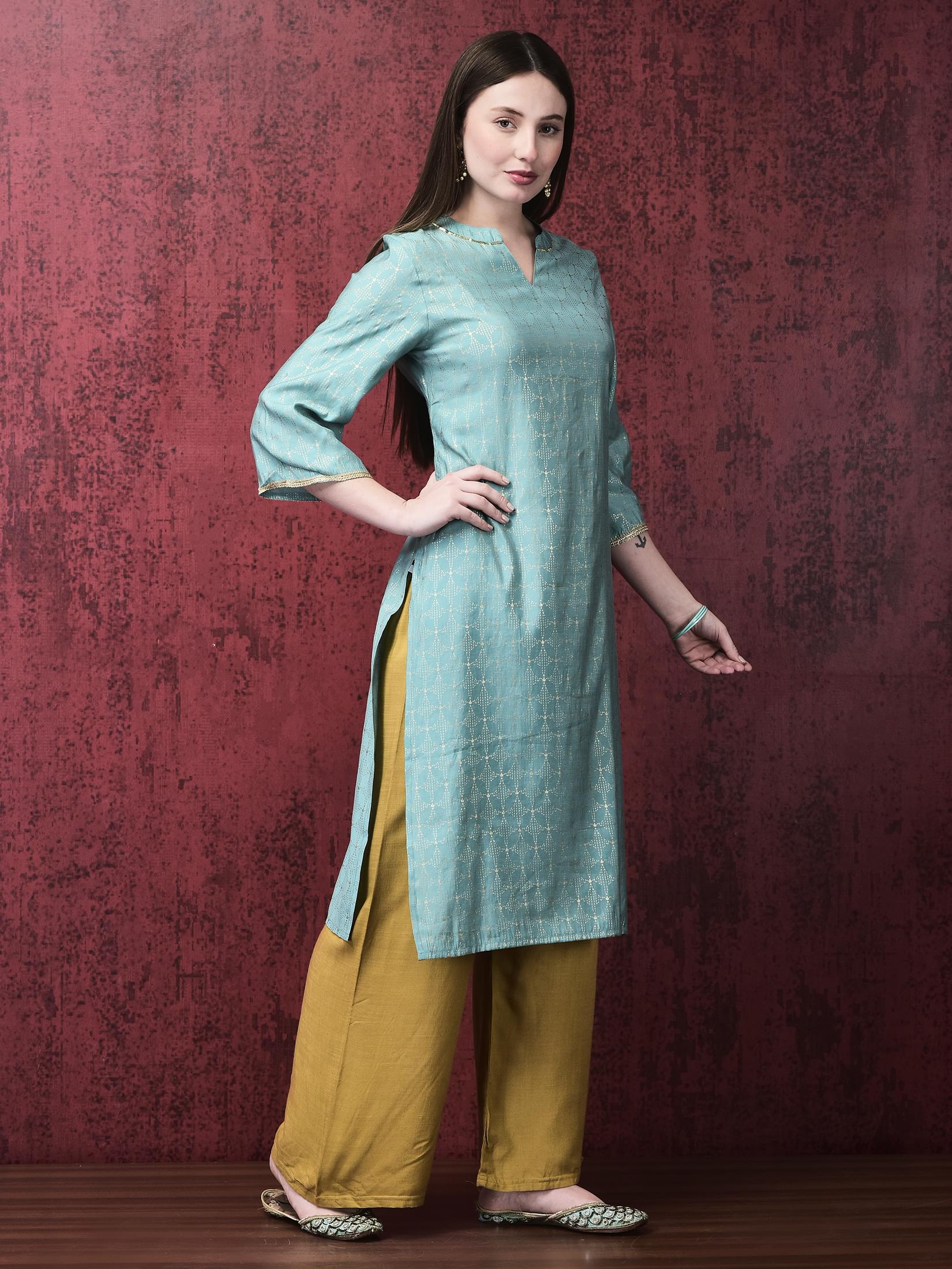 Women Liva Turquoise Blue Foil Print Kurta.