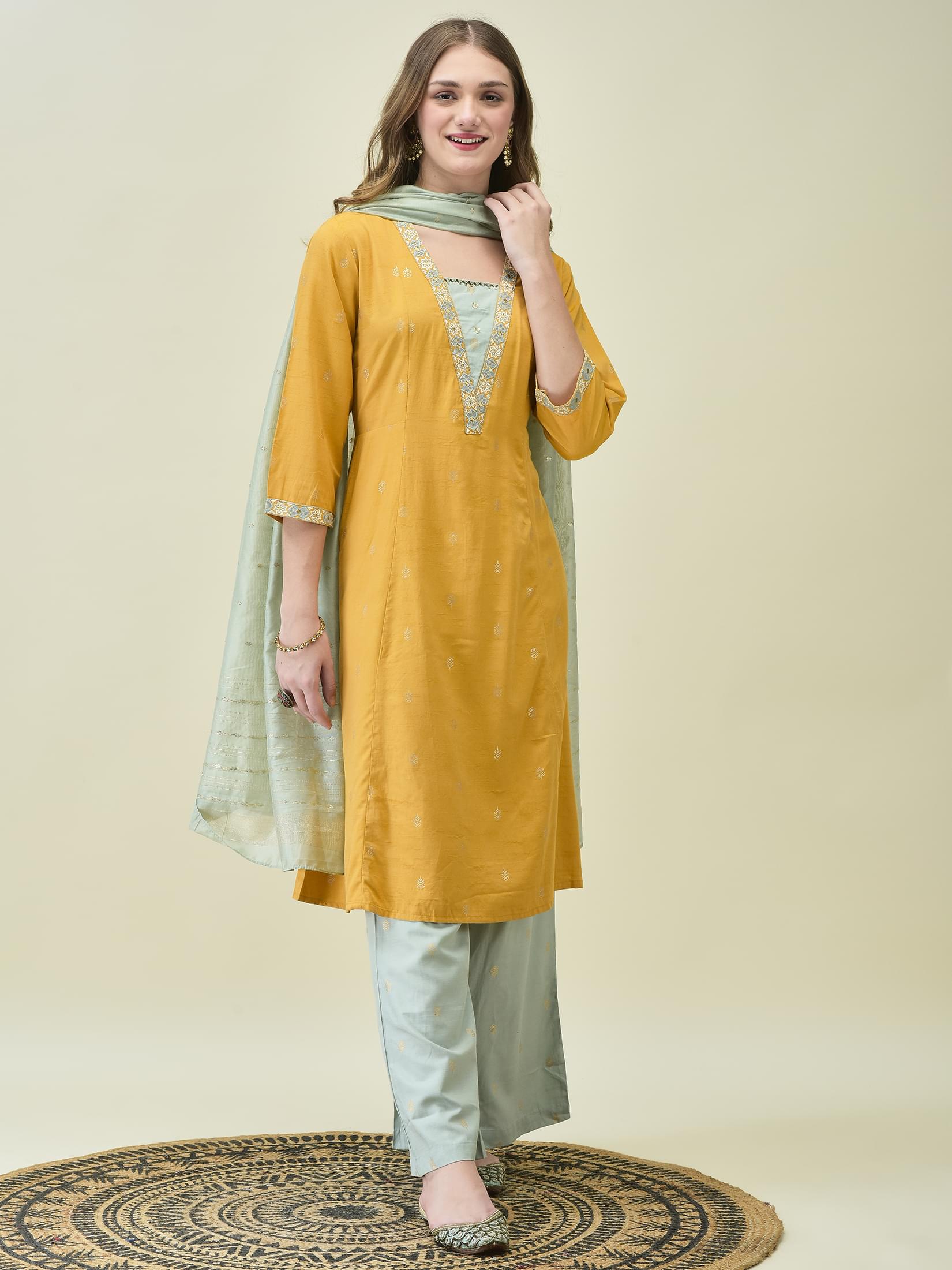 Vibrant mustard yellow basic solid Liva poly viscose fluid wide leg pant suit byshree
