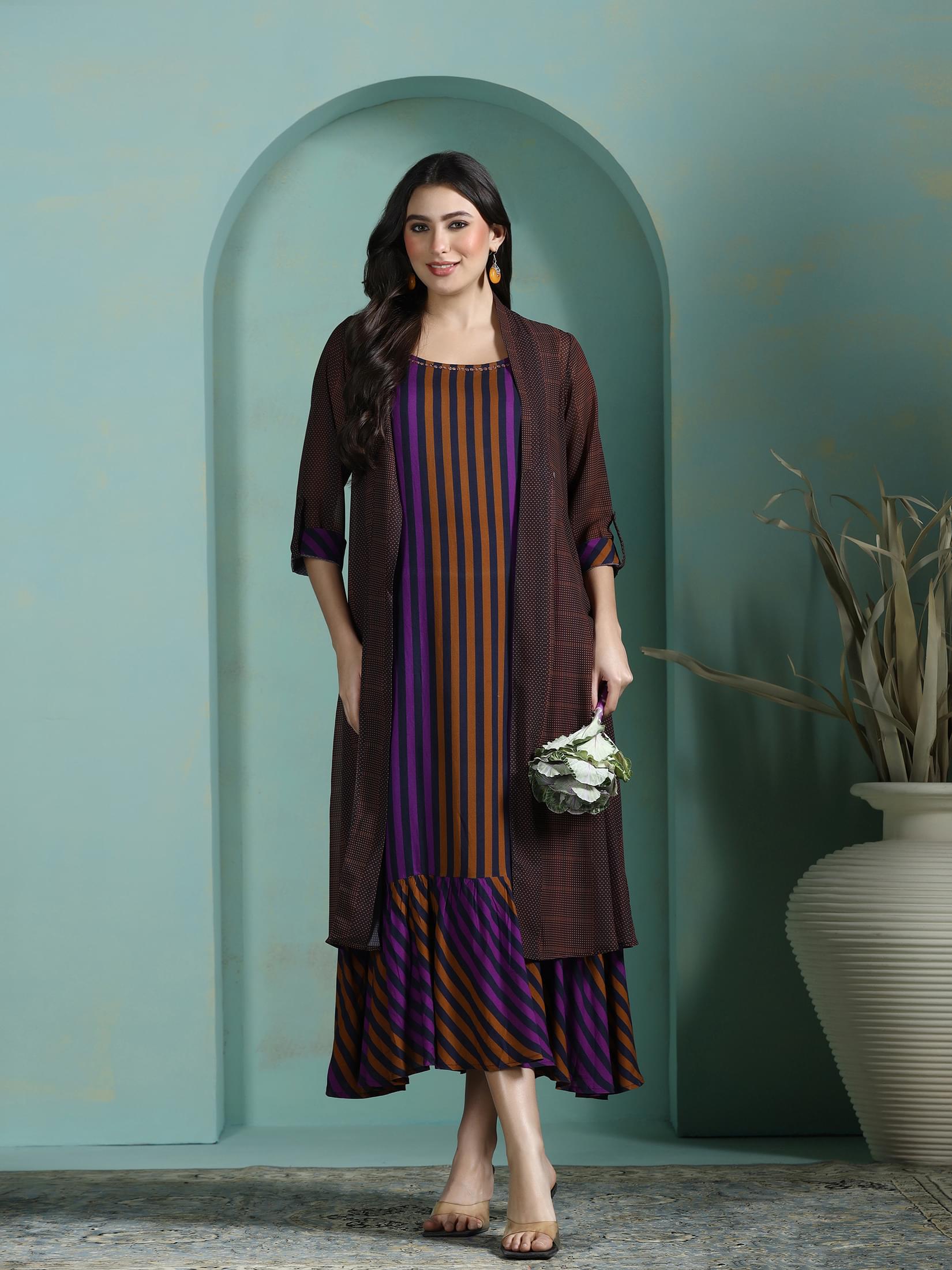 Multicolor stripe print Liva dress layered with matching georgette ethnic jacket byshree