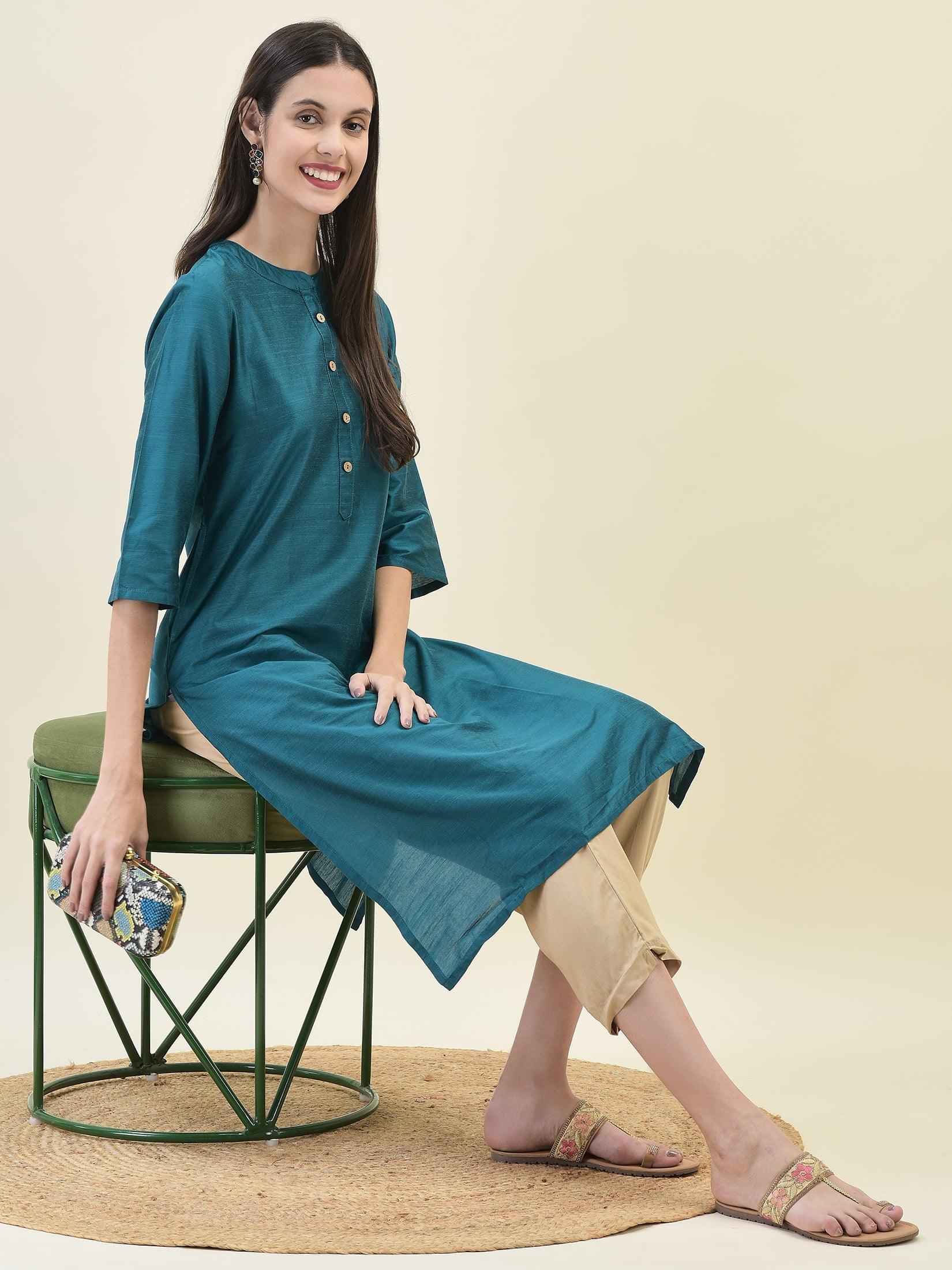 Women Silk Blend Teal Solid Kurta.