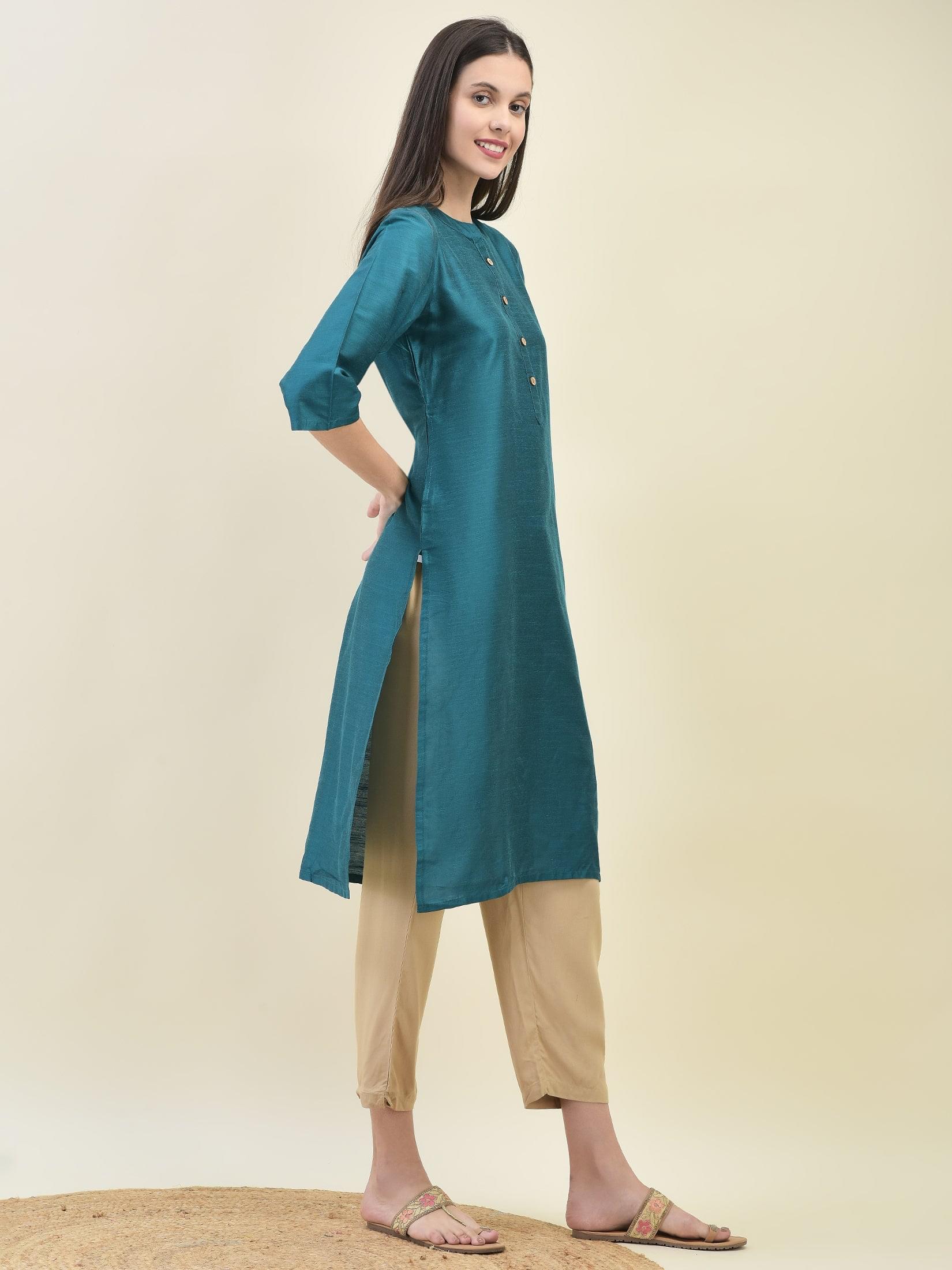 Women Silk Blend Teal Solid Kurta.