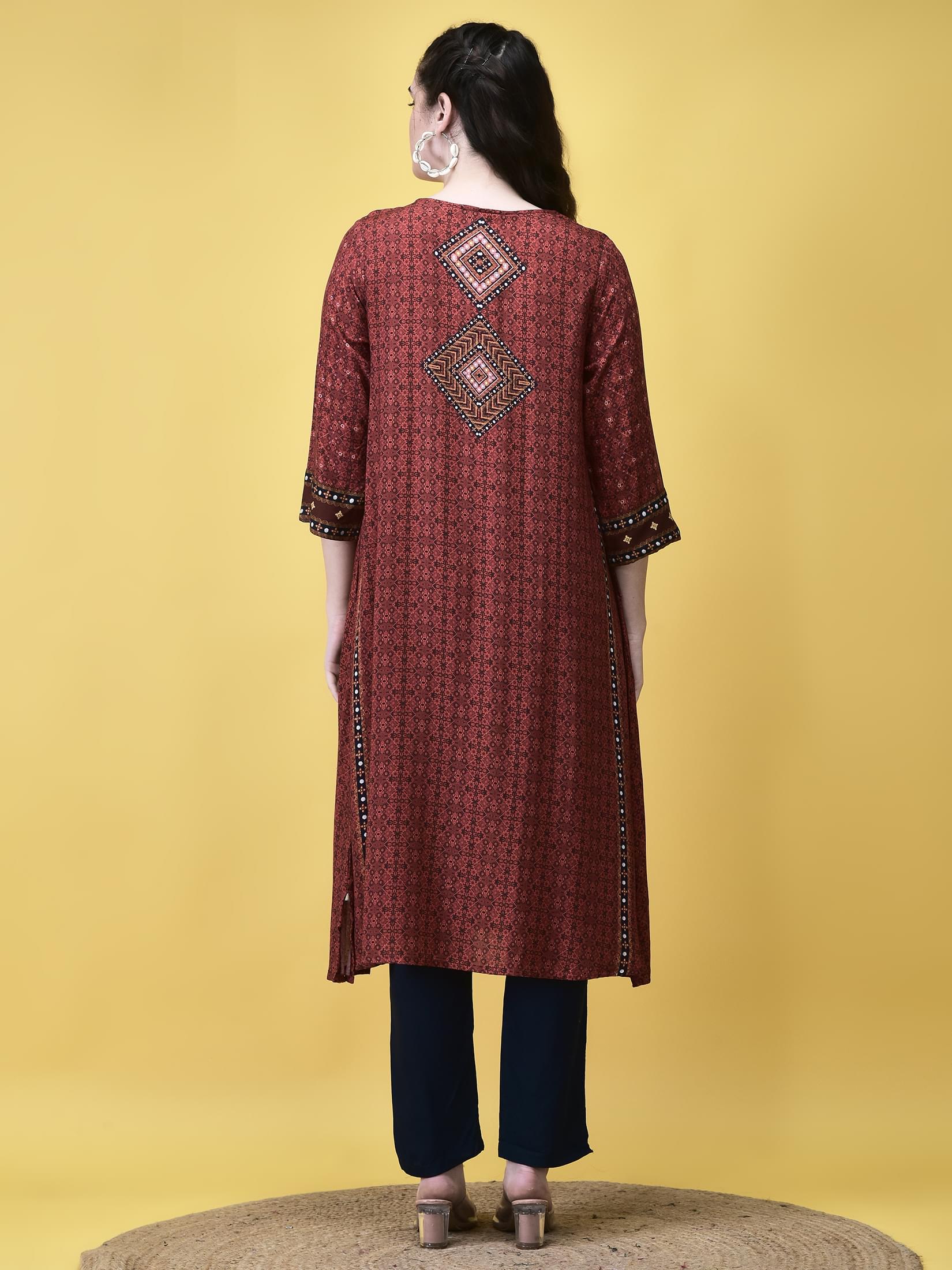 Women Liva Maroon Ornamental Print Kurta.