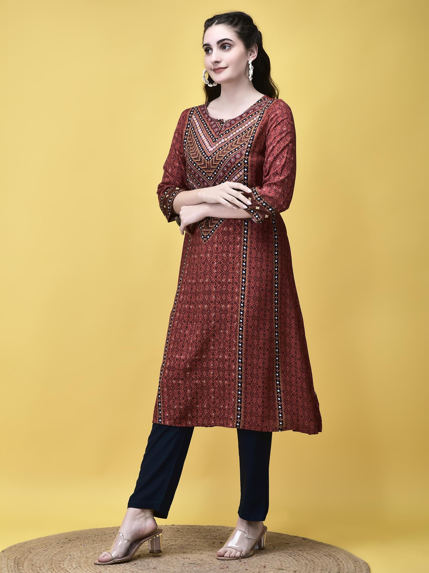 Women Liva Maroon Ornamental Print Kurta.