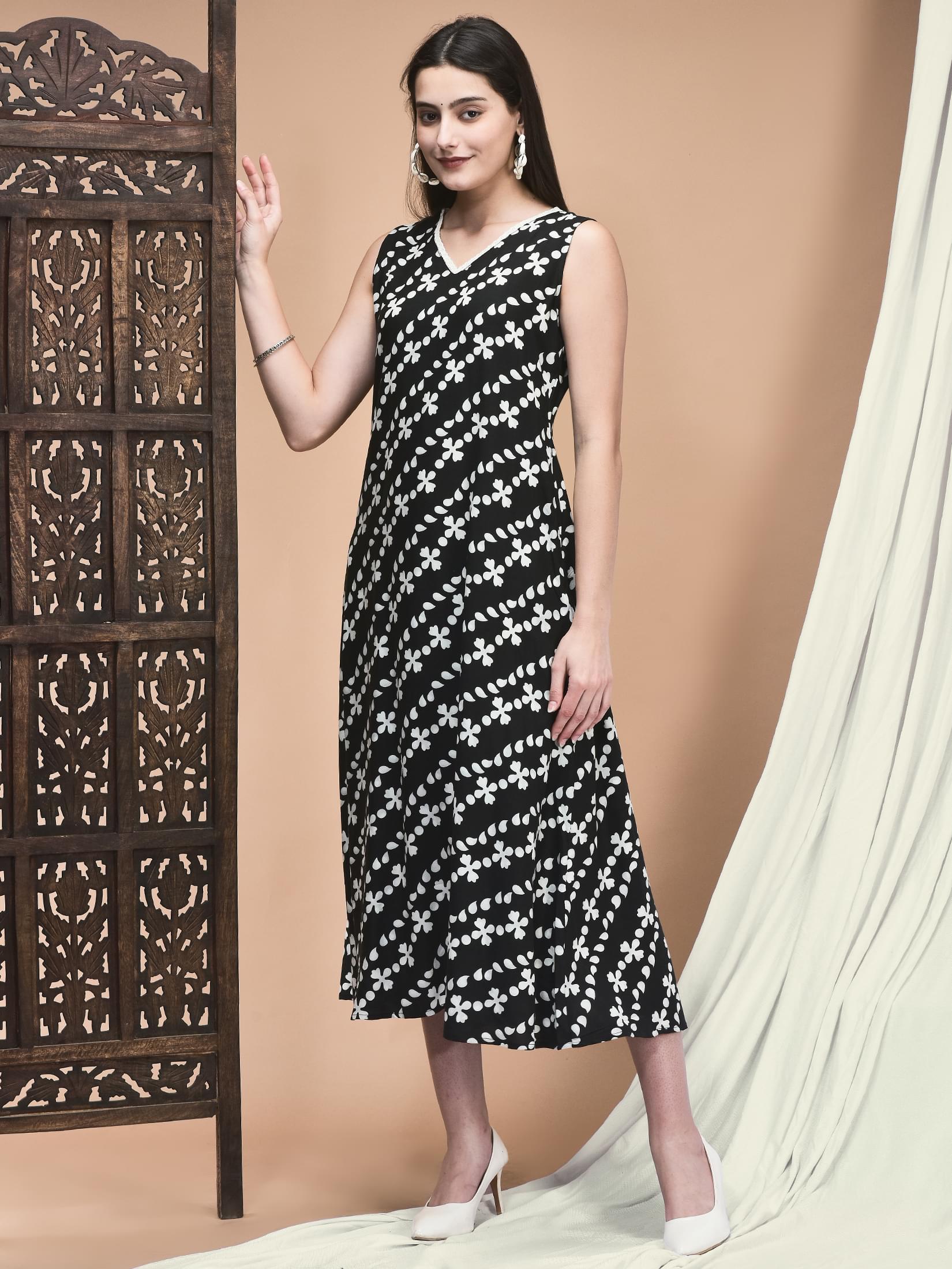 Women Liva Black and White Printed A-line Dress.