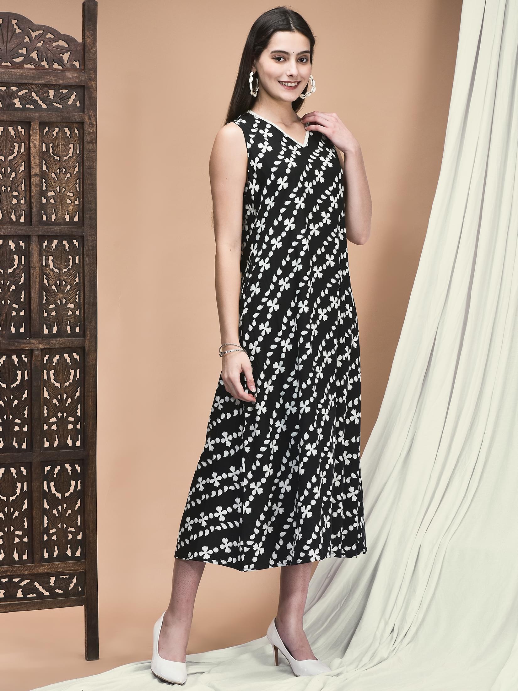 Women Liva Black and White Printed A-line Dress.