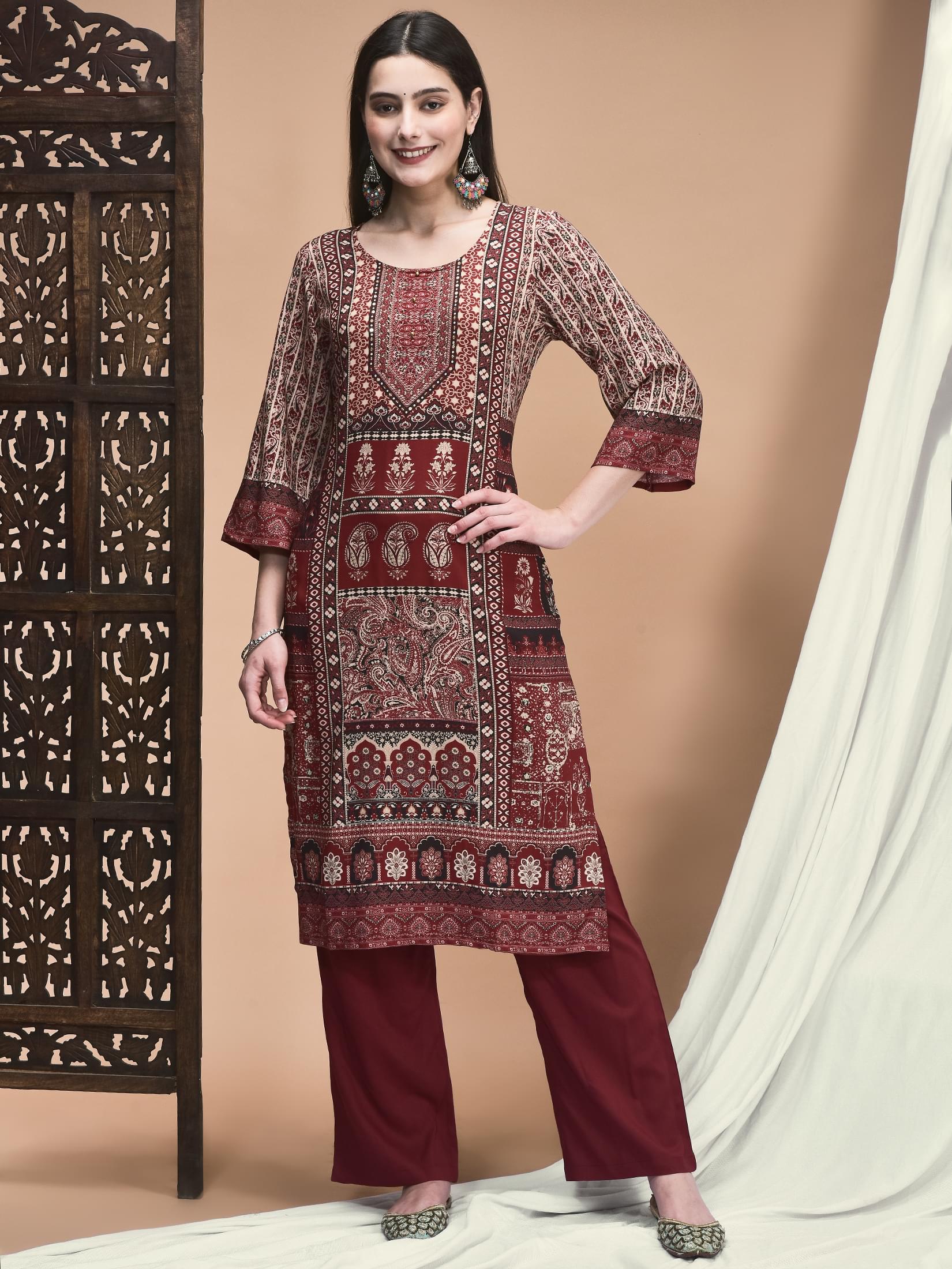 Women Liva Maroon Ornamental Print Kurta With Comfort Pant.