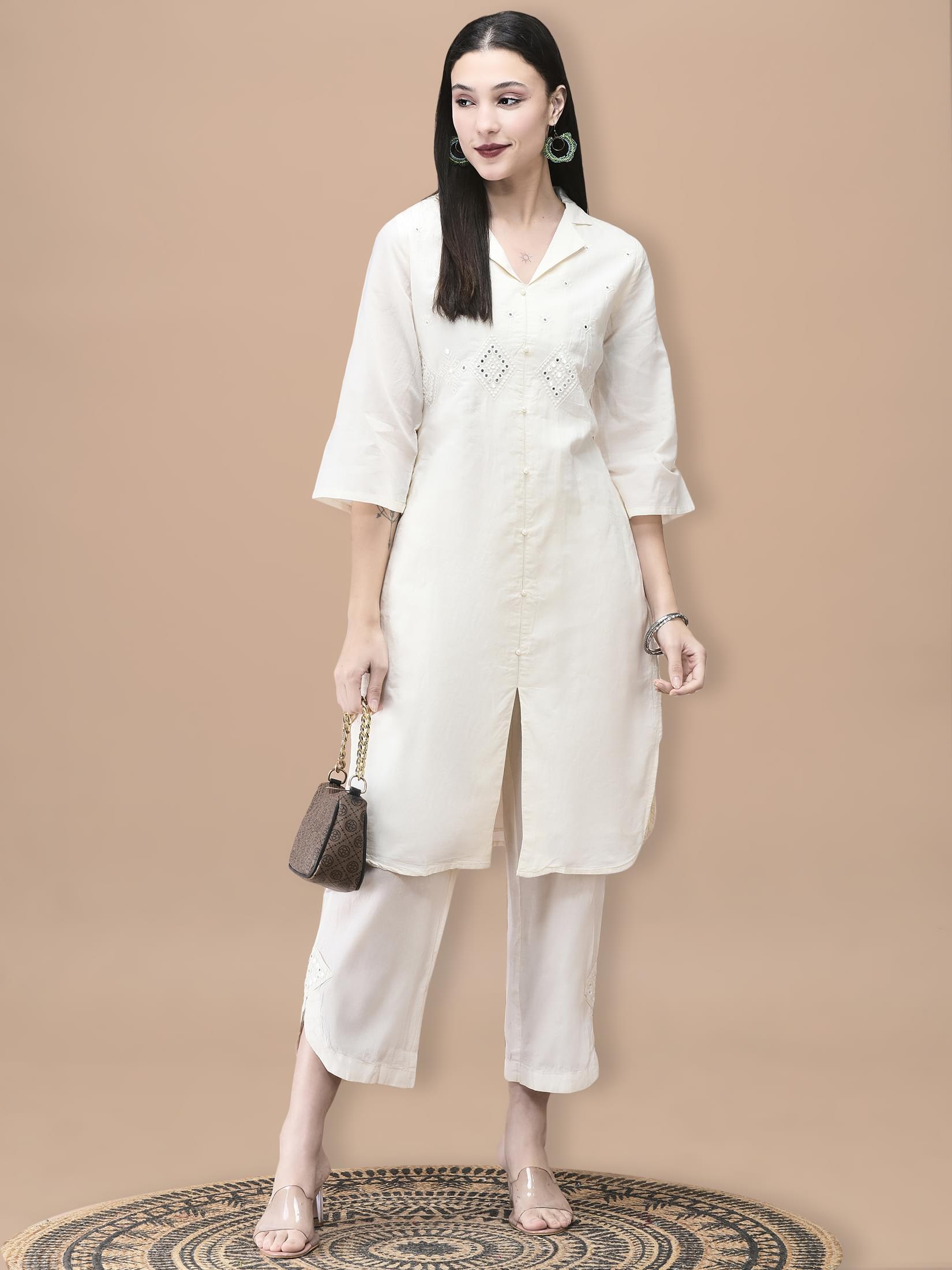 Women Cotton Off White Embroidered Kurta With Comfort Pant.