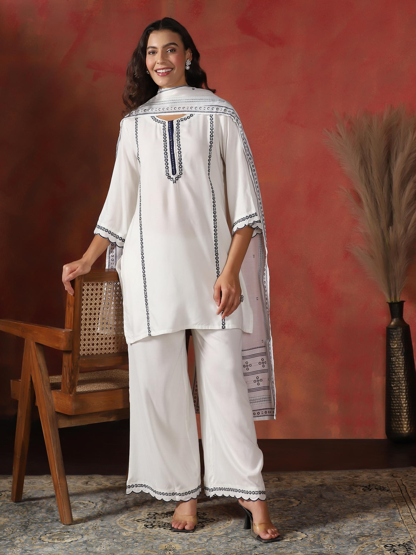 Clean off white embroidered Liva fabric casual wear straight silhouette suit