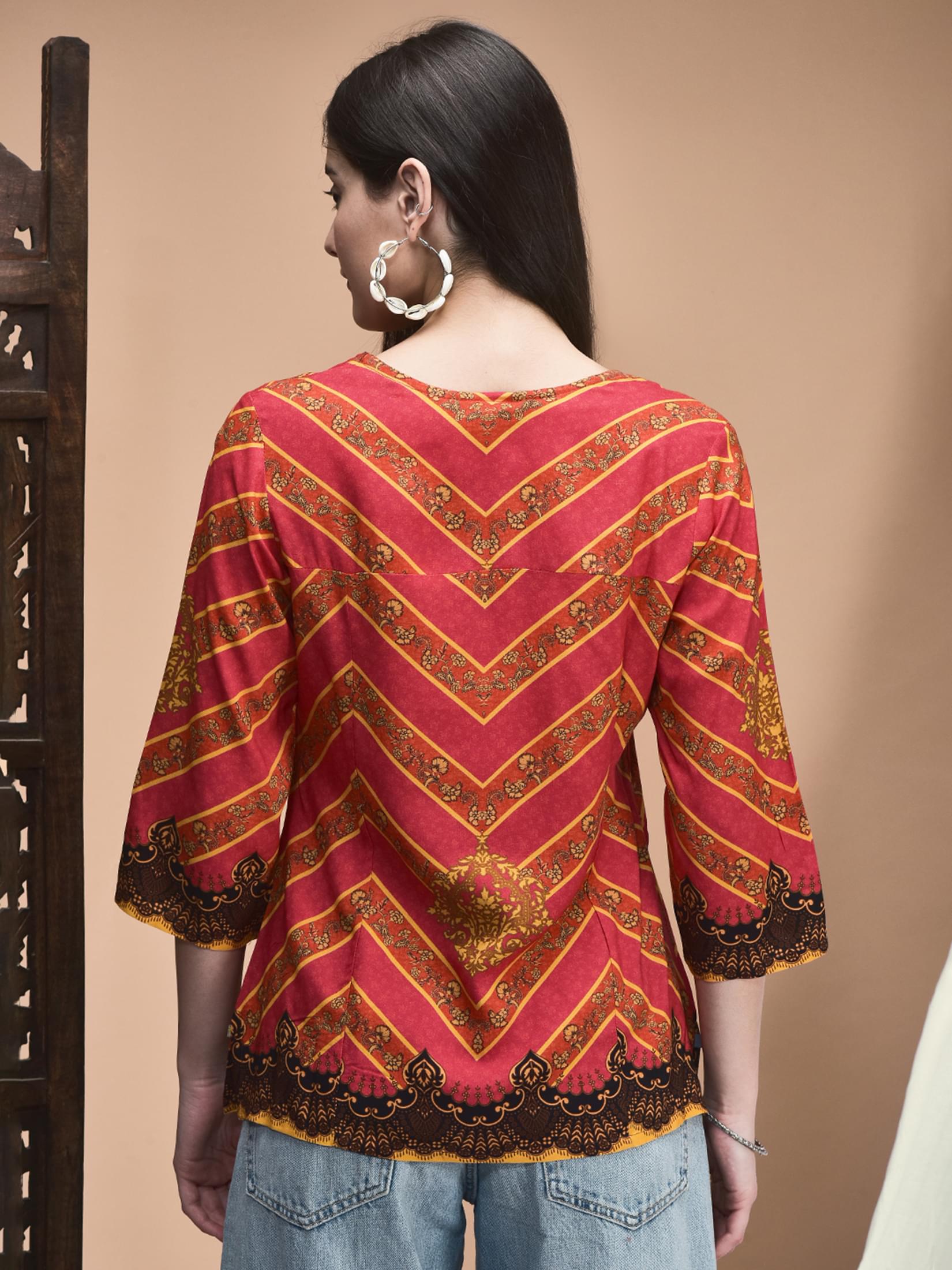 Women Viscose Orange Printed Tunic.