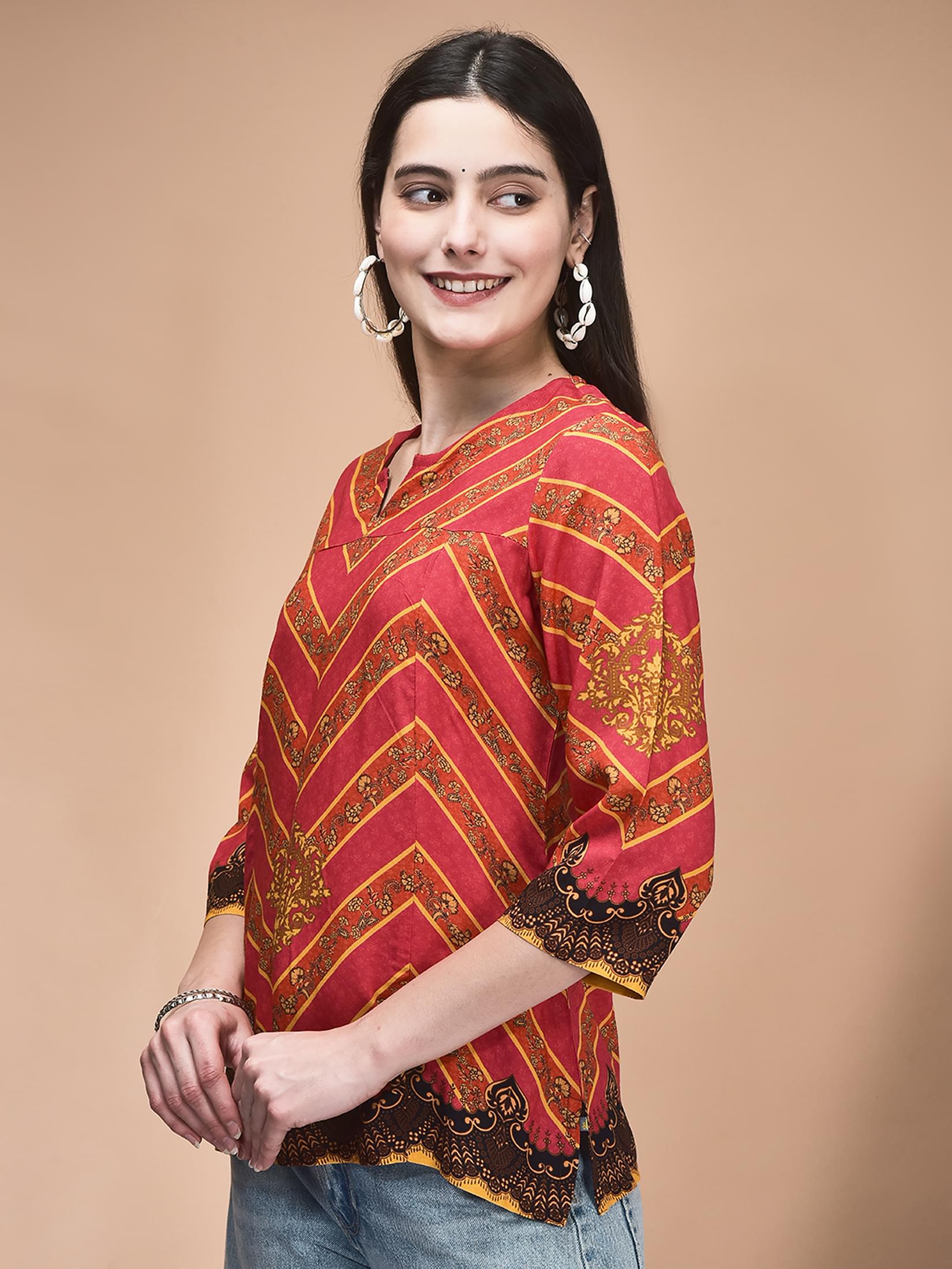 Women Viscose Orange Printed Tunic.