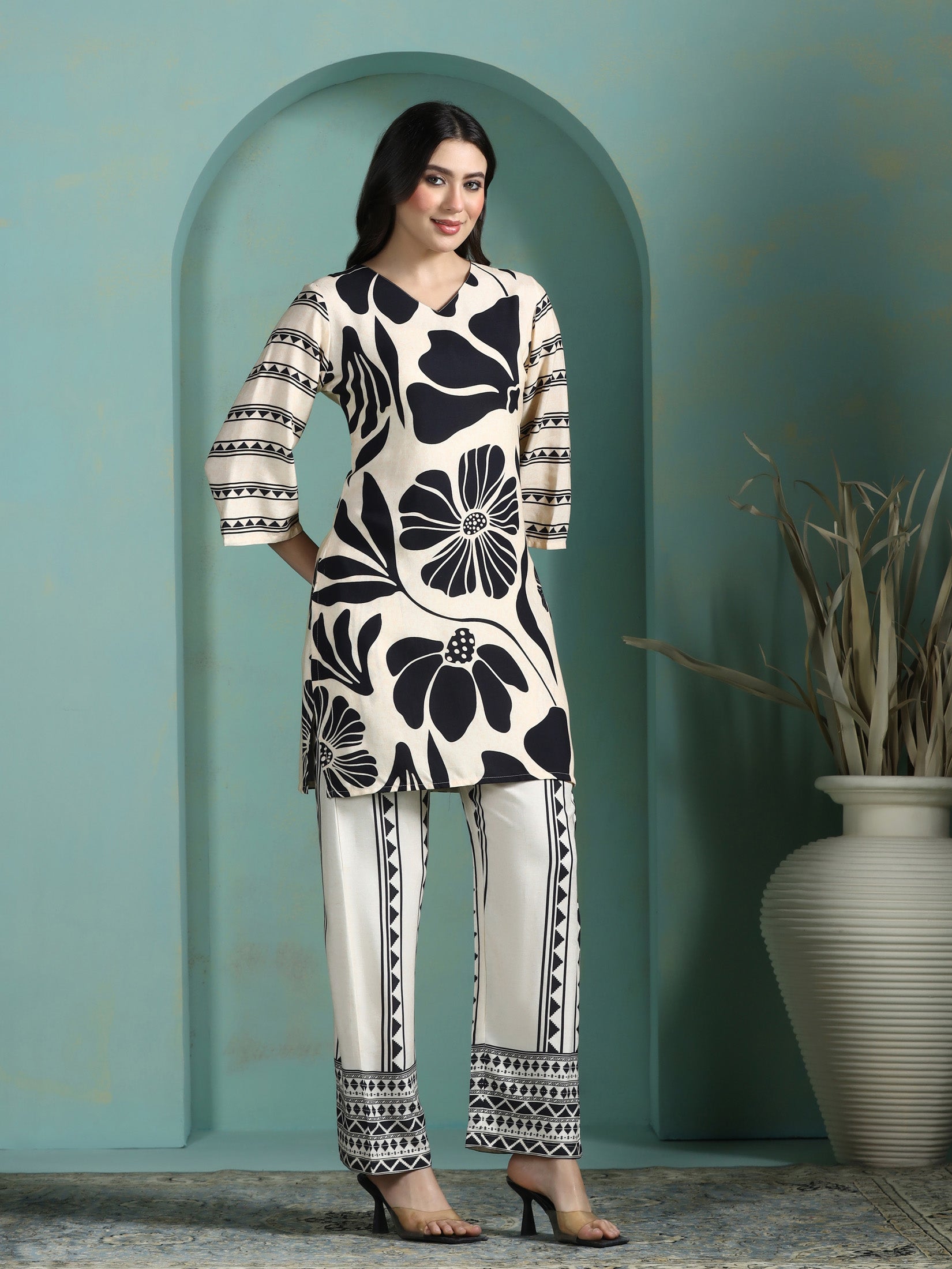 Women Liva Cream and Black Printed Kurta With Comfort Pant