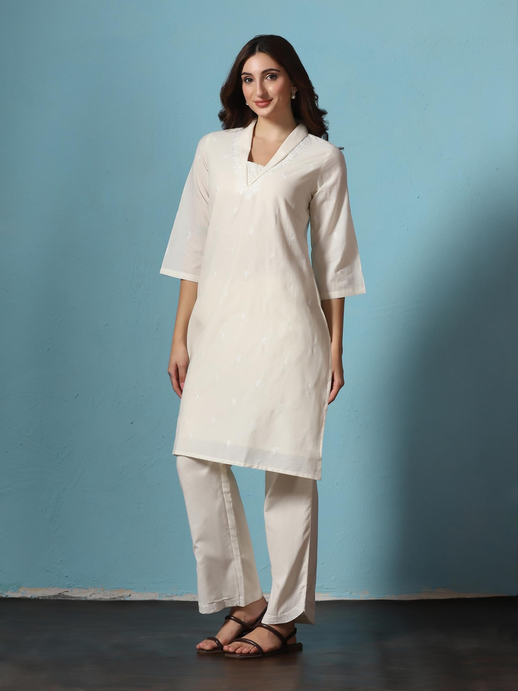 Women Cotton Off White Embroidered Kurta With Comfort Pant.