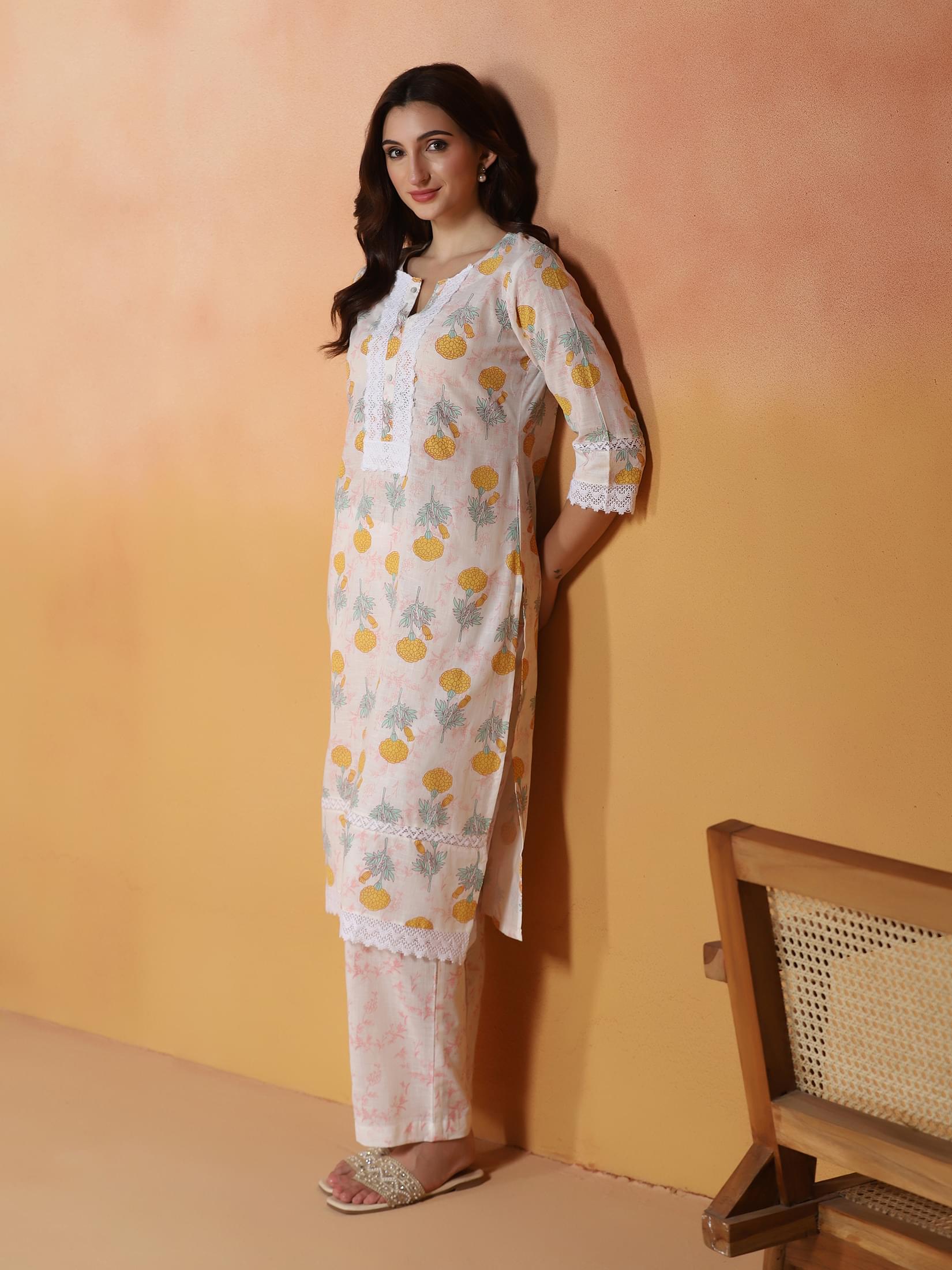 Women Cotton Off White Printed Kurta With Comfort Pant.