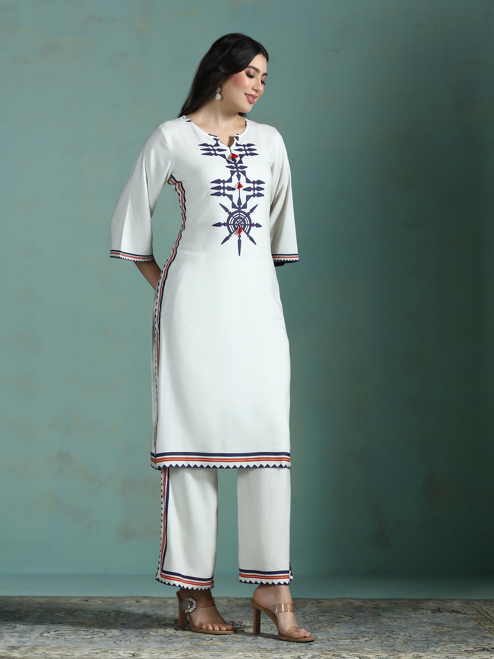 Women Liva Cream Printed Kurta With Comfort Pant.