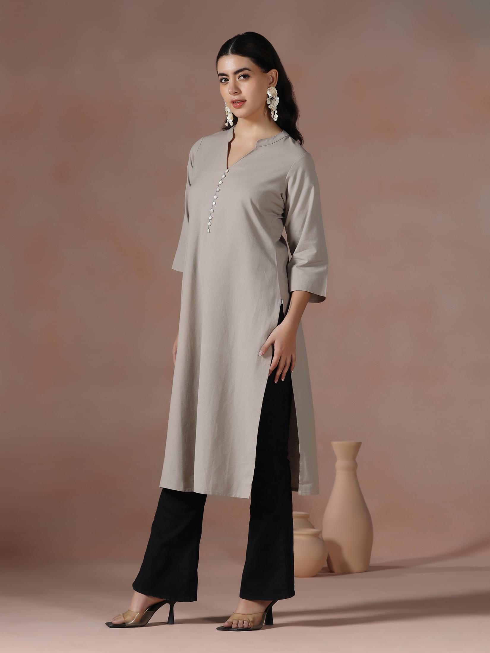Women Cotton Beige Solid Kurta.