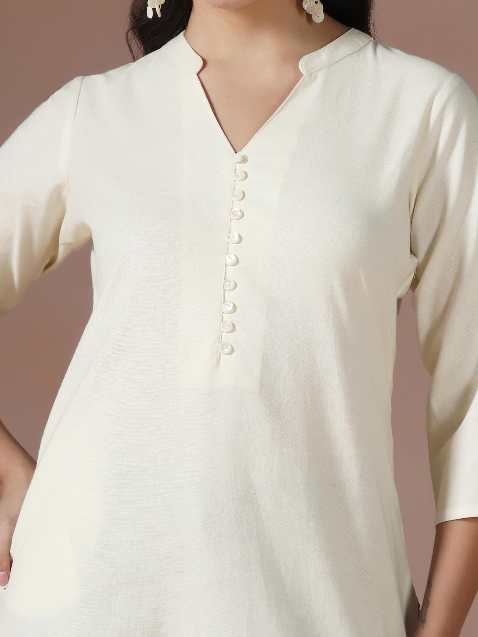 Women Cotton Off White Solid Kurta.