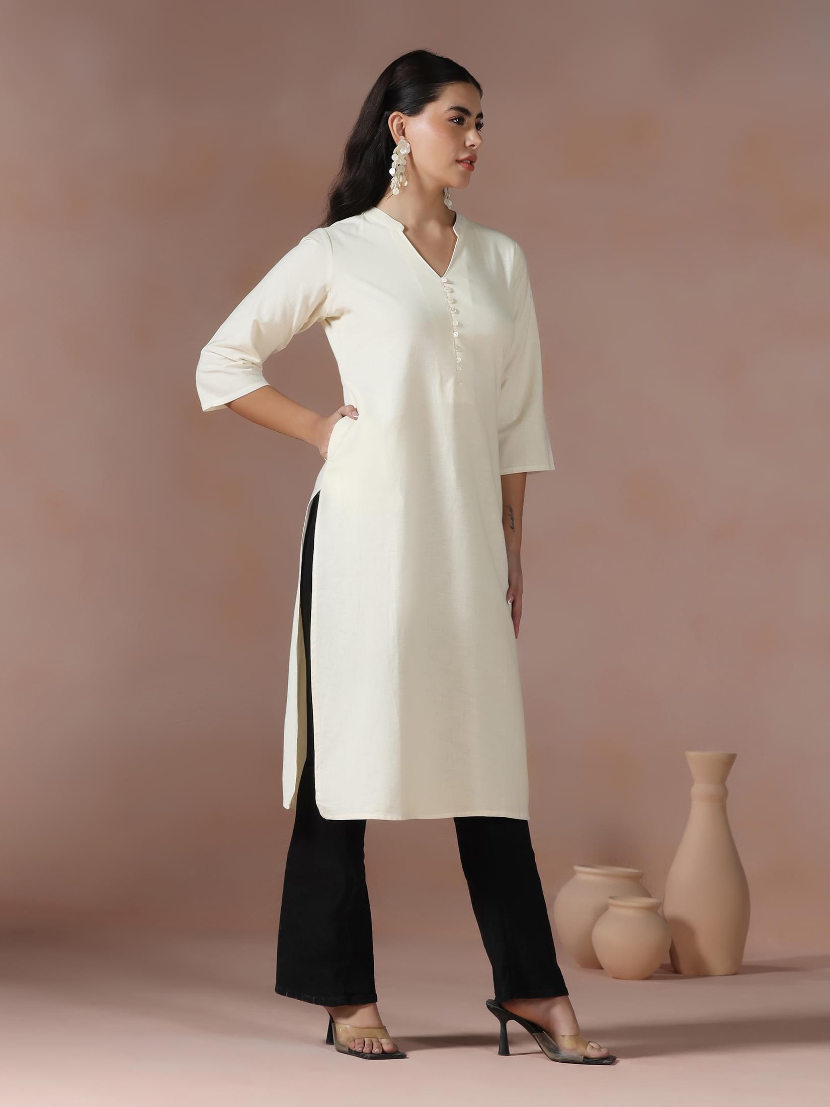 Women Cotton Off White Solid Kurta.