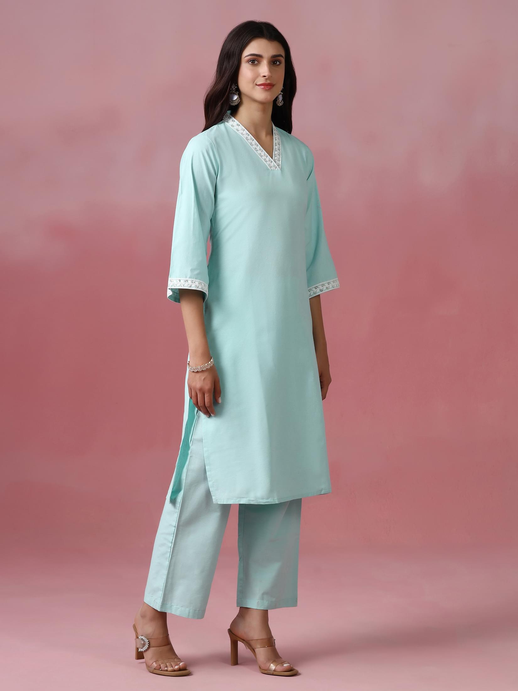Women Poly Cotton Green Embroidered Kurta With Comfort Pant.