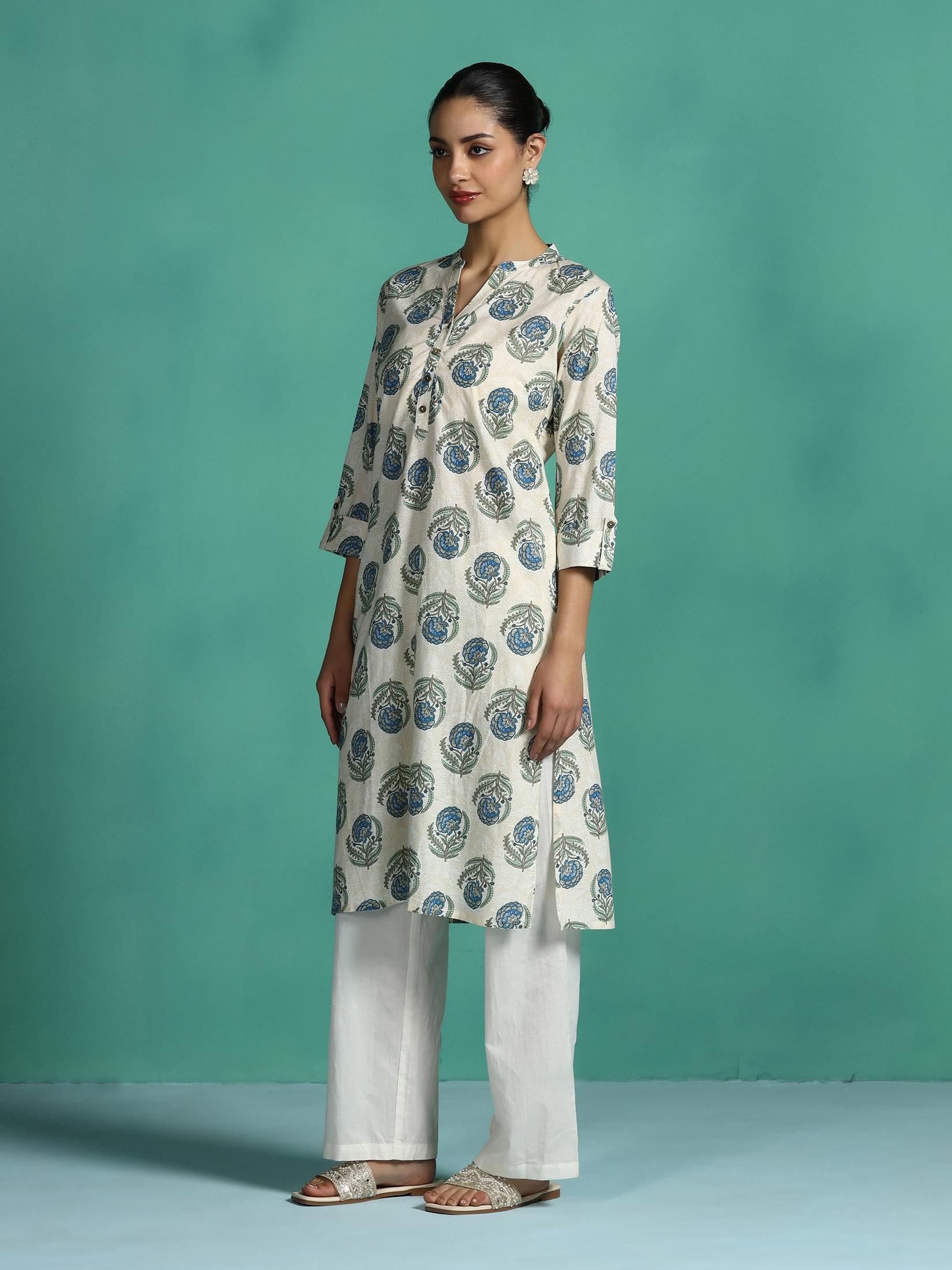 Women Cotton Off white and Teal Floral Print Kurta.