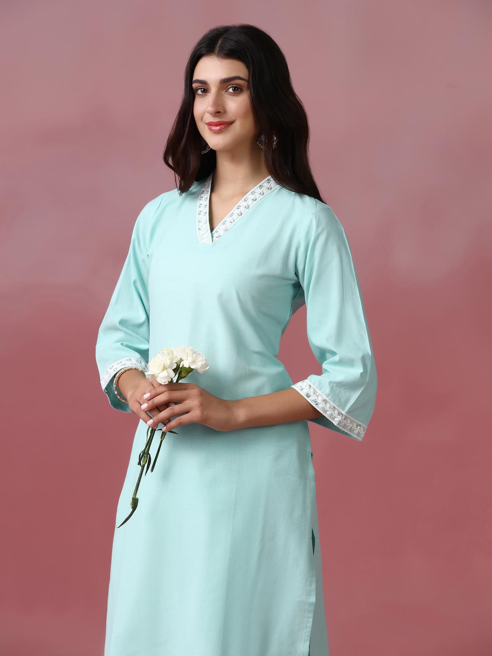 Women Poly Cotton Green Embroidered Kurta With Comfort Pant.