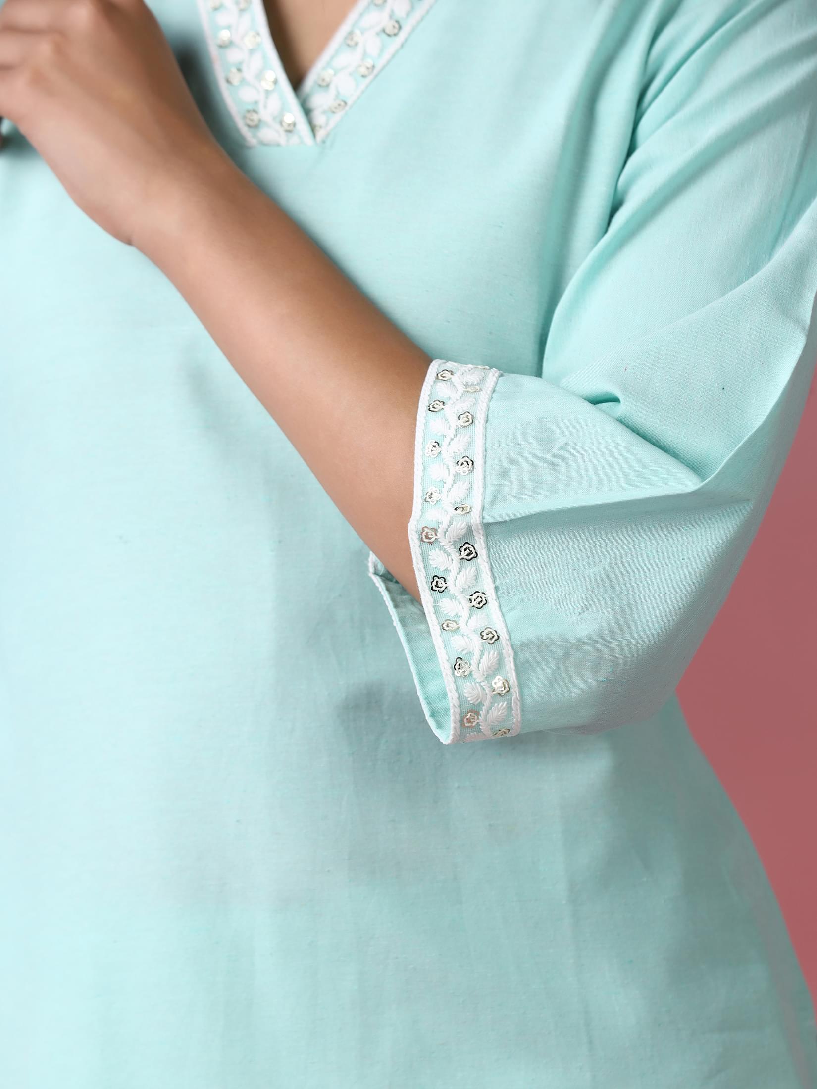 Women Poly Cotton Green Embroidered Kurta With Comfort Pant.