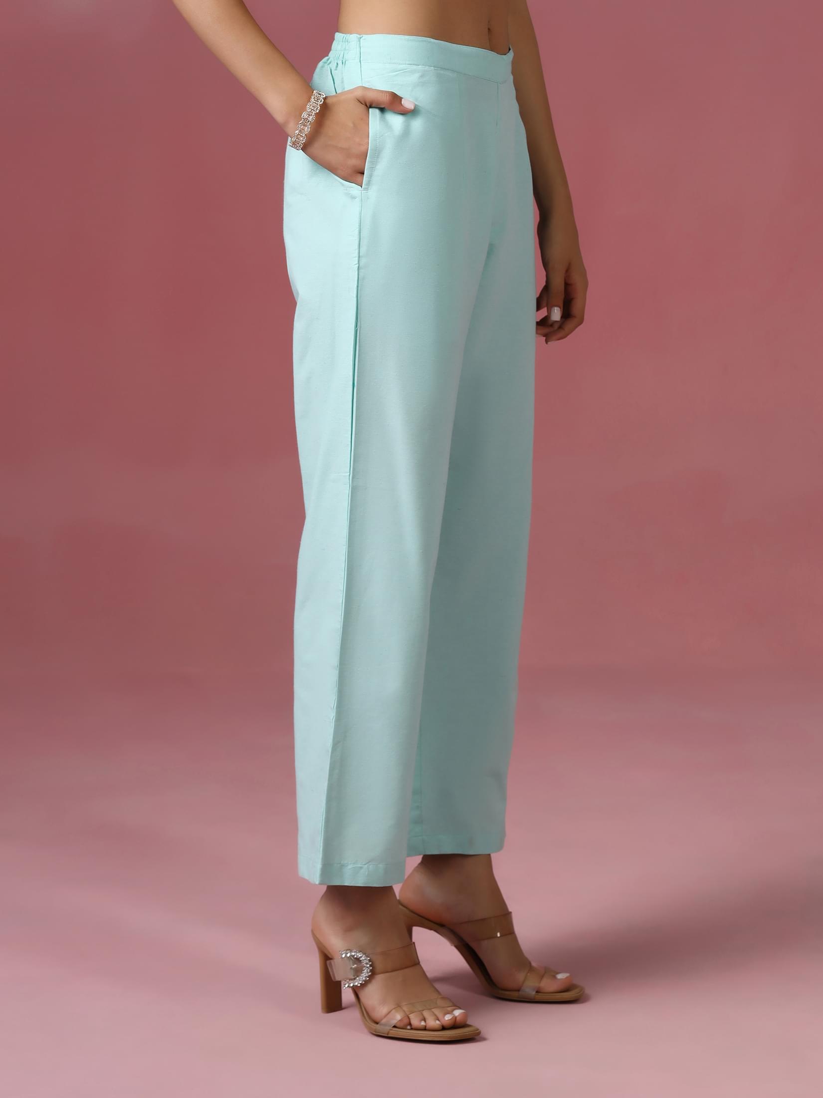 Women Poly Cotton Green Embroidered Kurta With Comfort Pant.