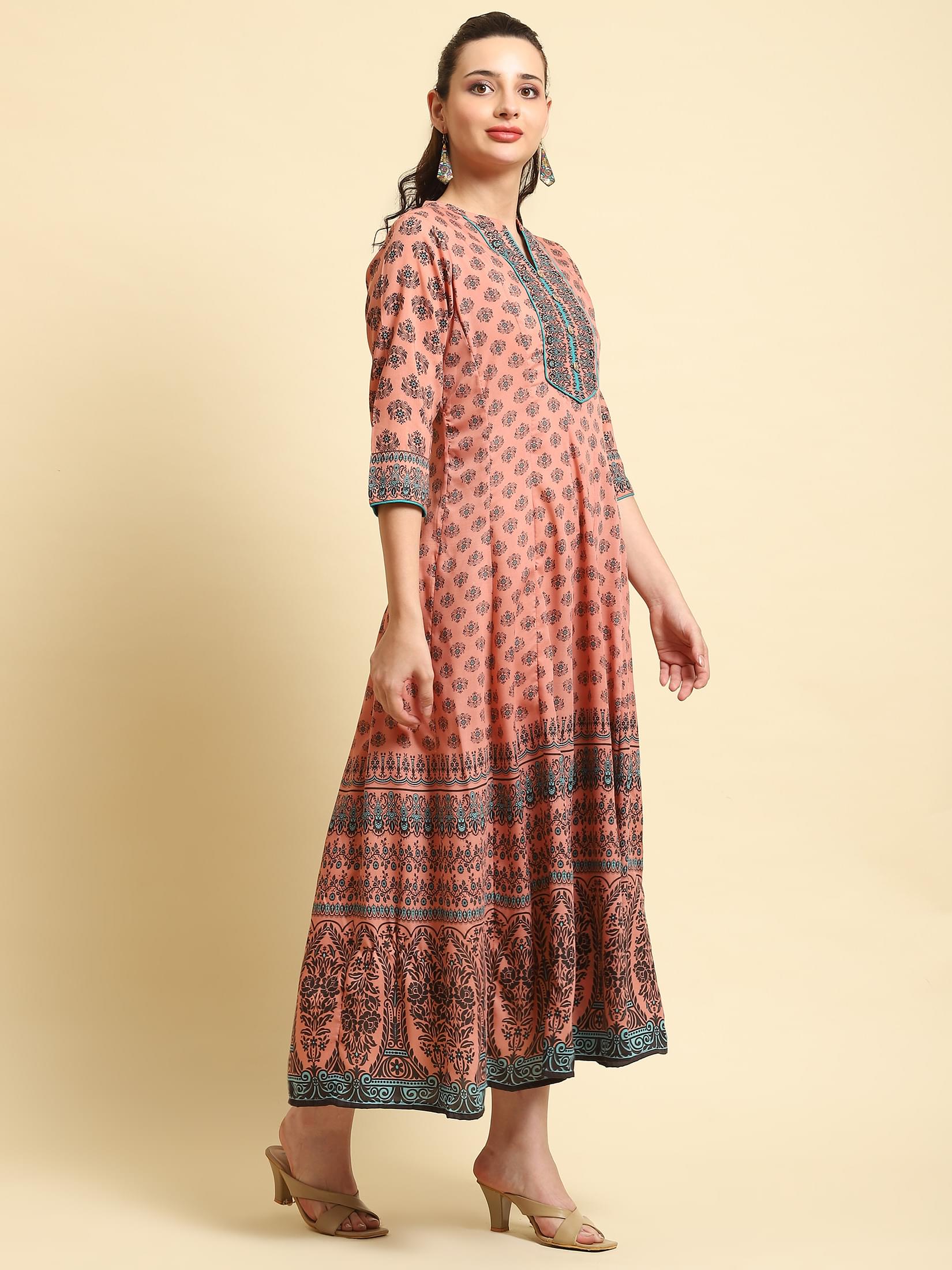 Women Peach Ornamental Printed Dress.