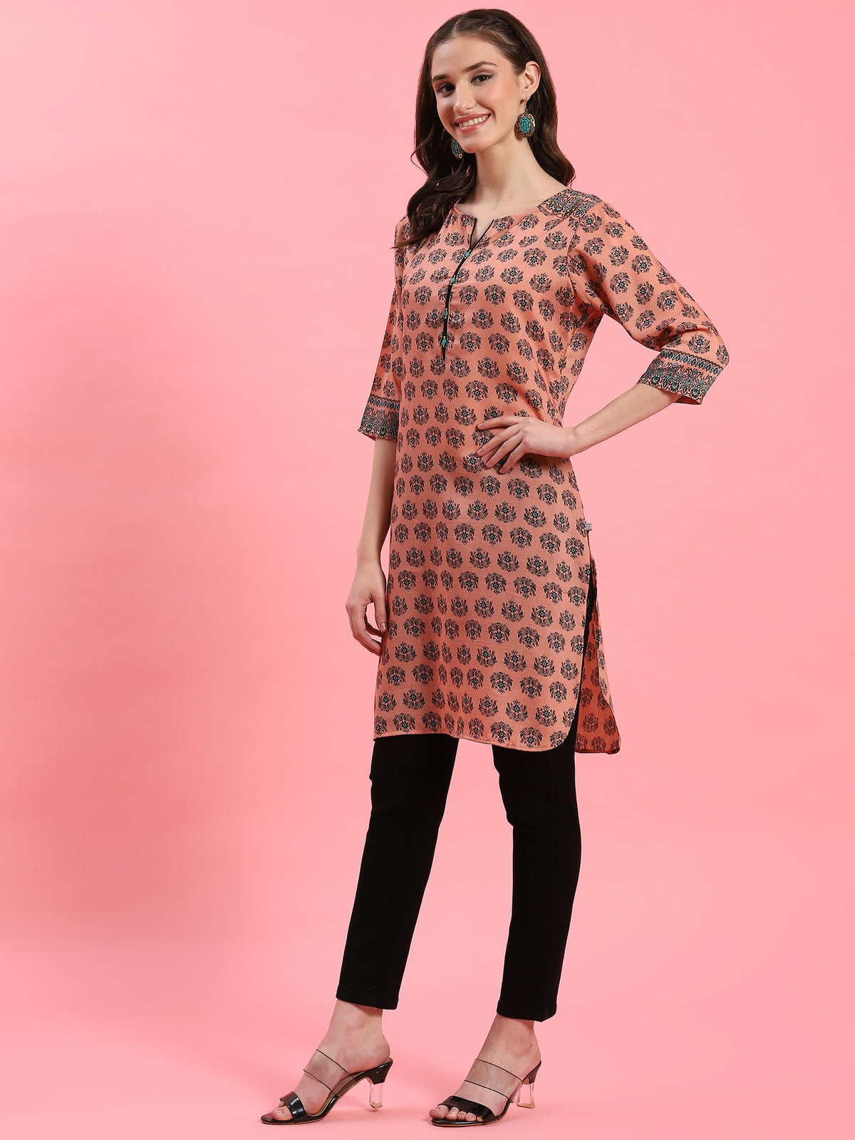 Women Peach Ornamental Printed Kurti.