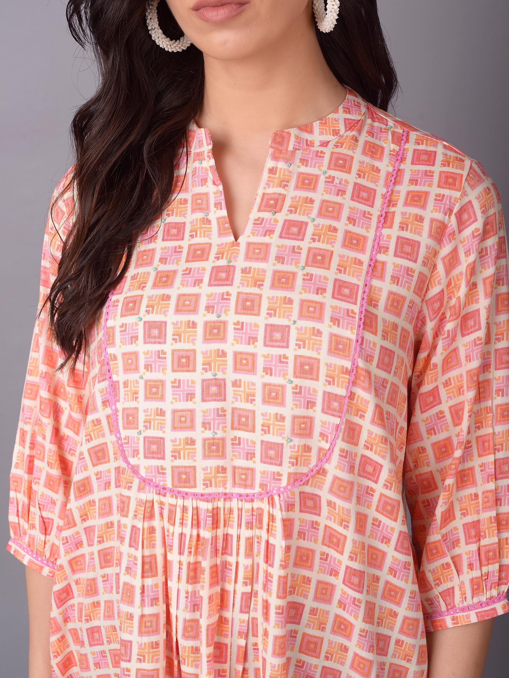 Women Peach Liva (Rayon) Geometric Printed Tunic.