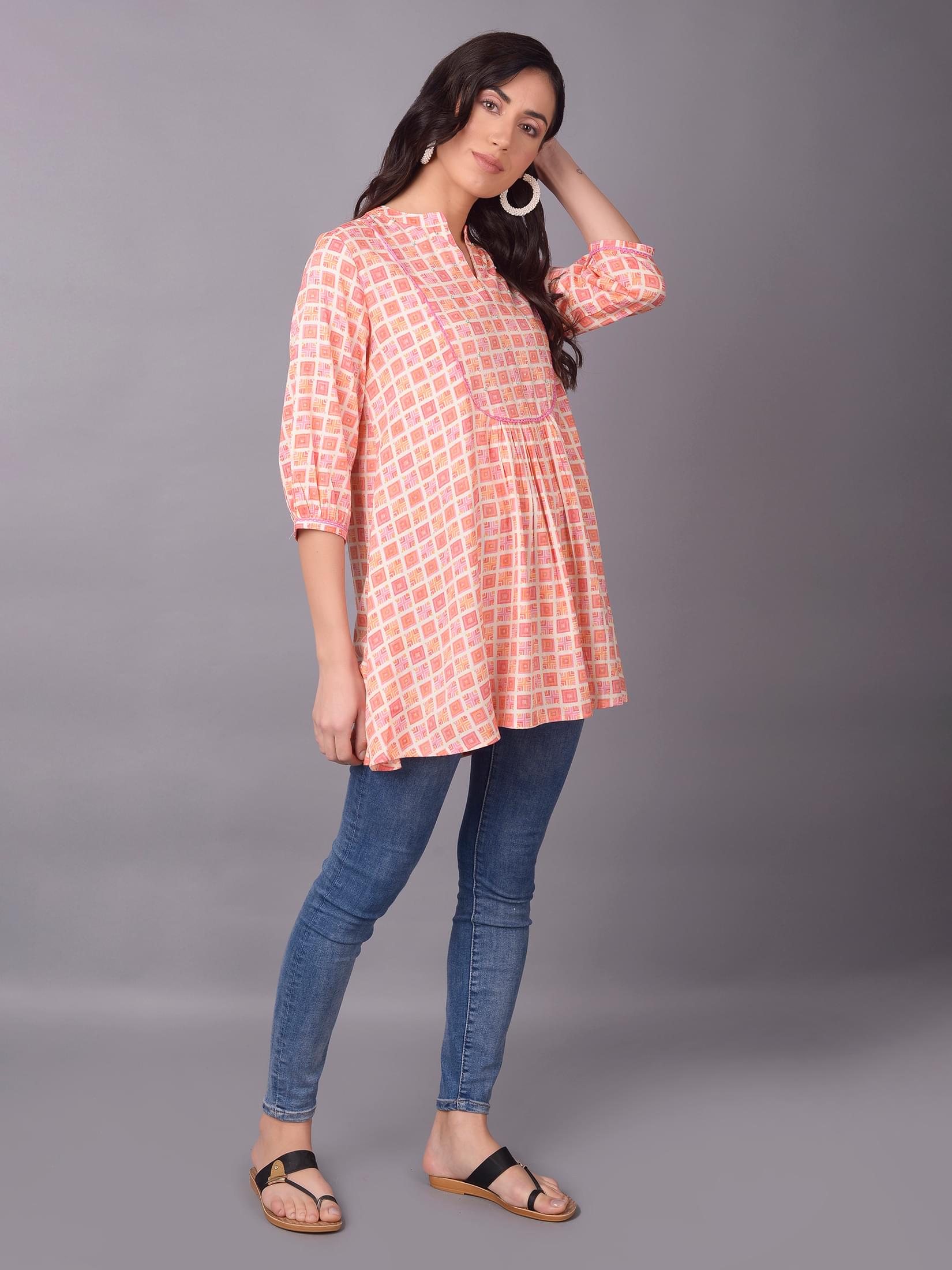 Women Peach Liva (Rayon) Geometric Printed Tunic.