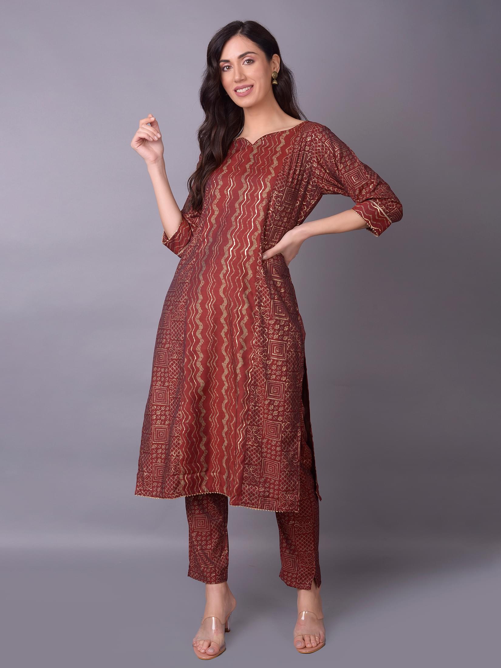 Women Maroon Ornamental Printed Kurta Trouser Dupatta.