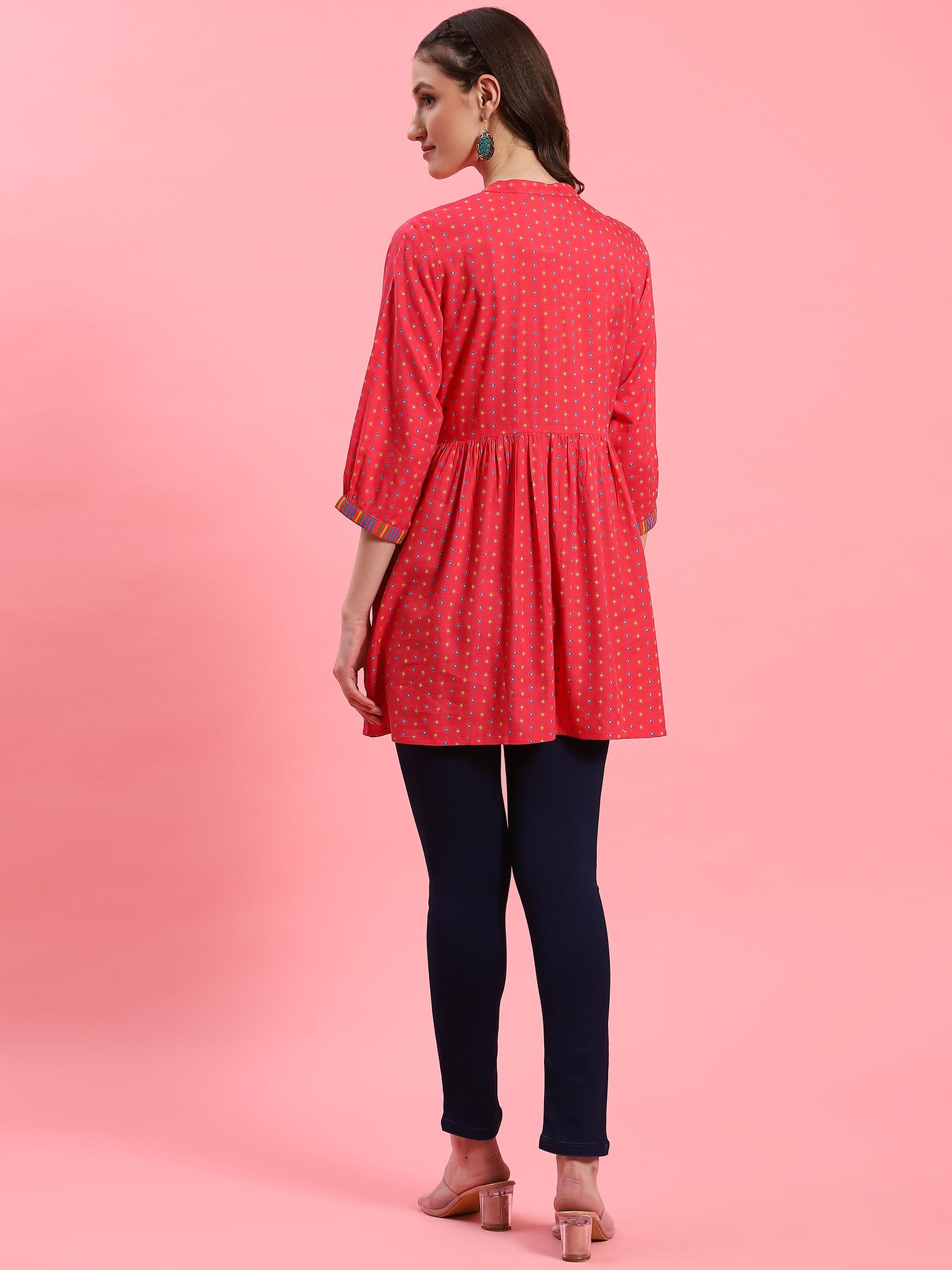Women Fuchsia Geometric Printed Tunic.