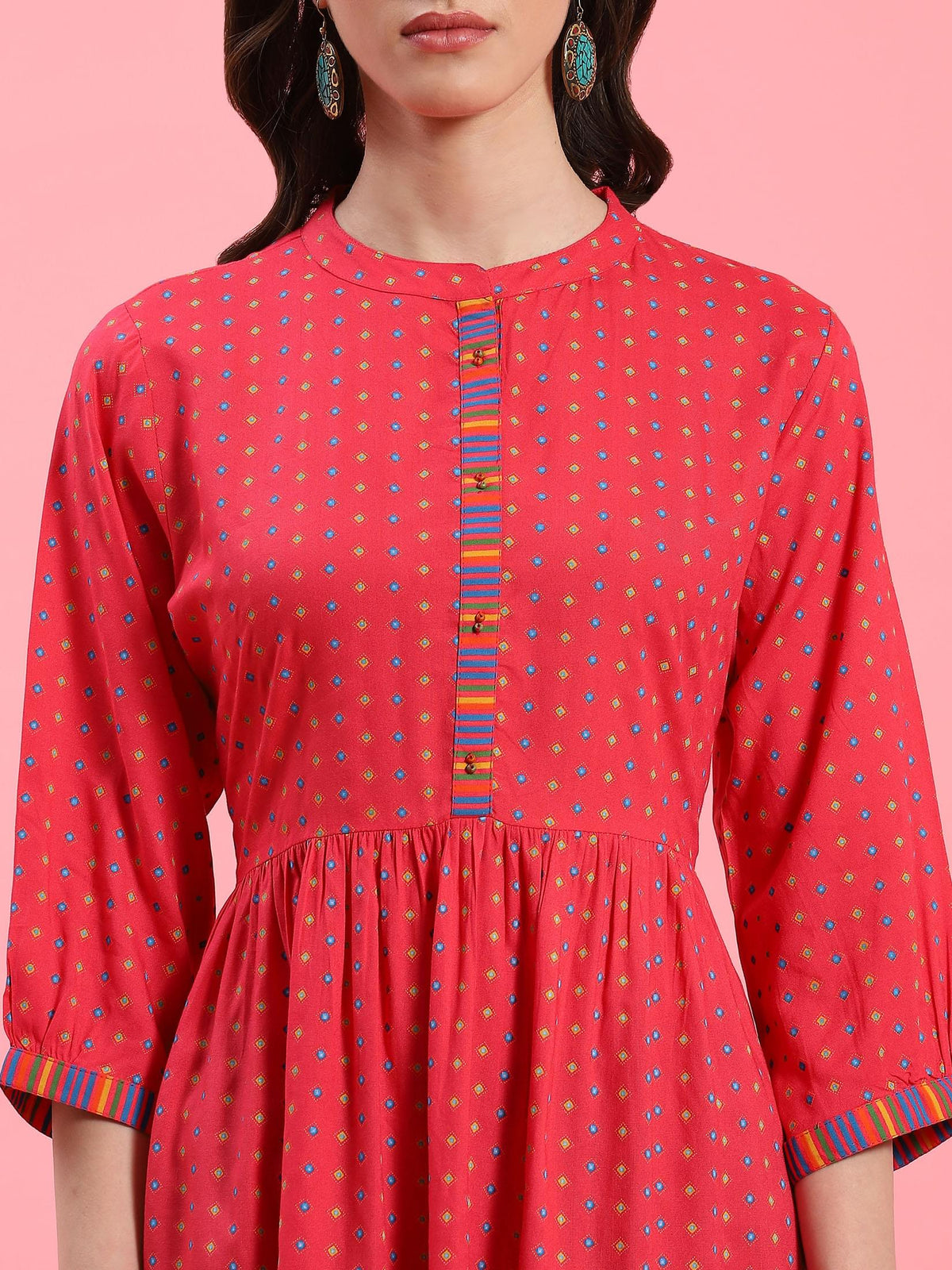 Women Fuchsia Geometric Printed Tunic.